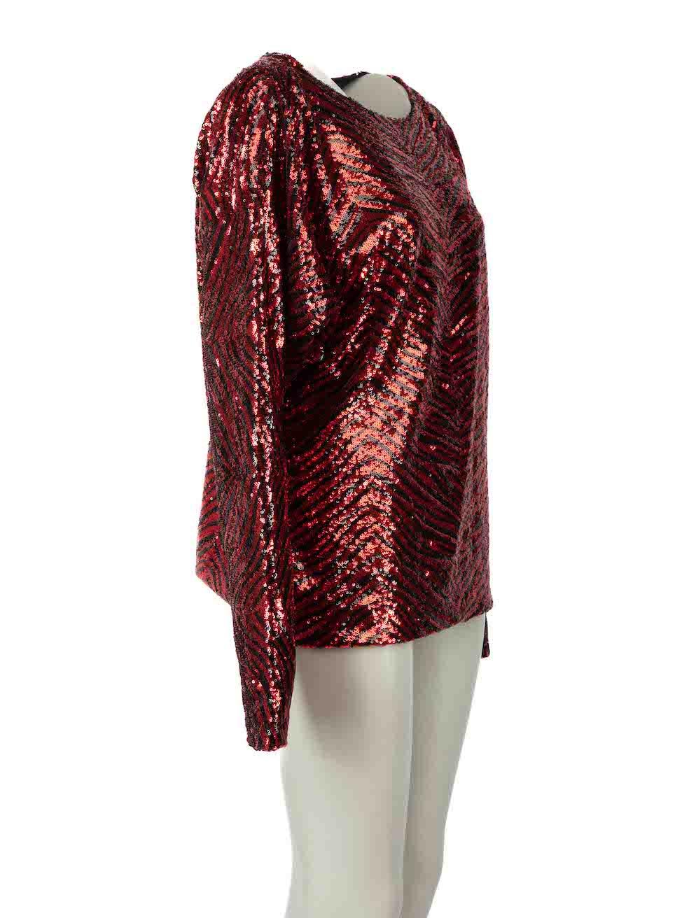 CONDITION is Very good. Hardly any visible wear to top is evident on this used Alexandre Vauthier designer resale item.

Details
Red
Polyester
Sequin top
Tiger pattern
Long sleeves
Round neck

Made in France 

Composition
100% Polyester

Care