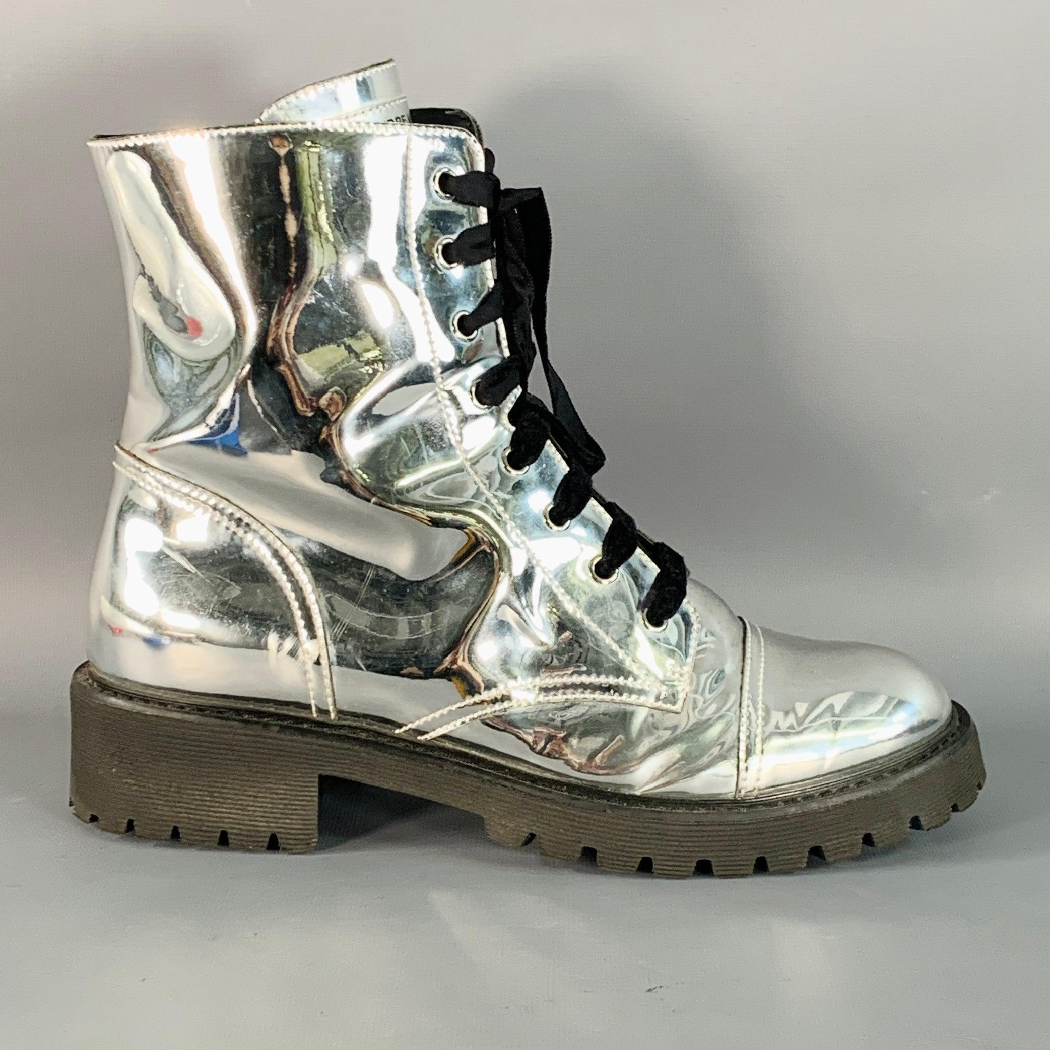 ALEXANDRE VAUTHIER combat boots
in a metallic silver tone leather featuring a rubber lug sole, and side zipper closure with velvet laces. Made in Italy.Excellent Pre-Owned Condition.  

Marked:   IT 40 

Measurements: 
  Length: 11.25 inches Width: