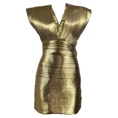 Alexandre Vauthier Spring 2024 Look 4 gold pleated lame dress