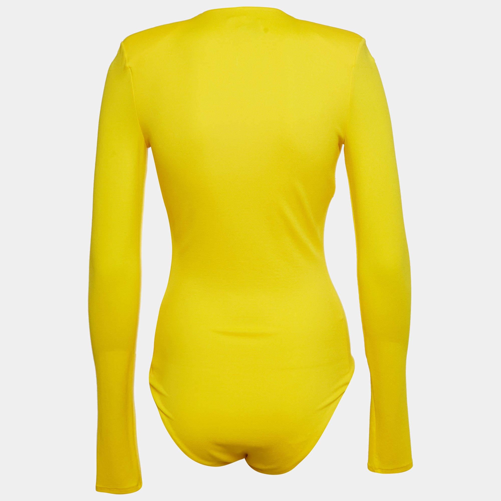 This vibrant yellow V neck bodysuit by Alexandre Vauthier combines sleek design with a flattering silhouette. Crafted from stretch jersey  it offers a snug yet comfortable fit that effortlessly accentuates your figure. The bold hue and deep neckline