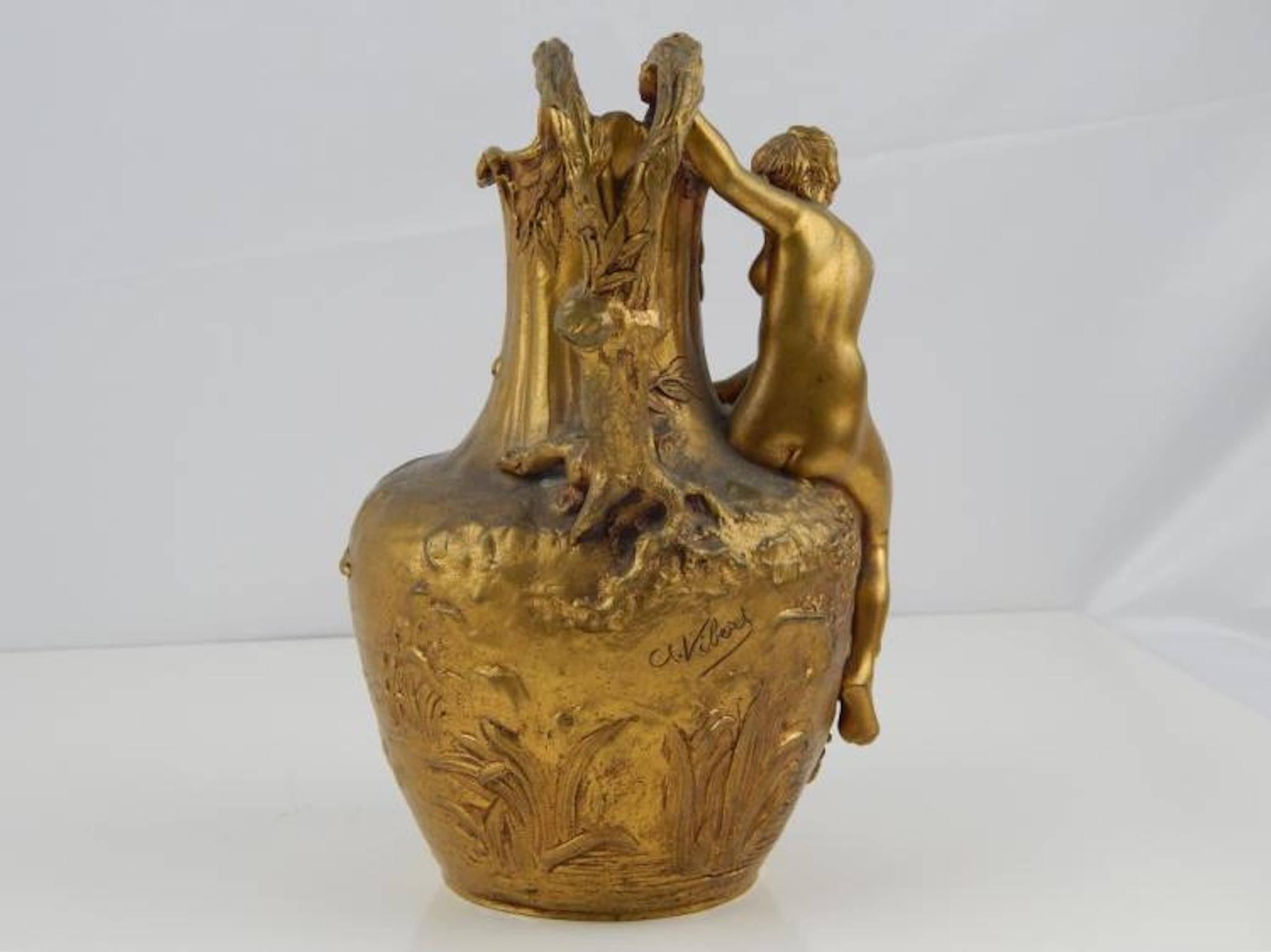 Alexandre Vibert (1847-1909) original doré bronze figural pitcher. Signed by artist. Measures 7in height by 6in width.