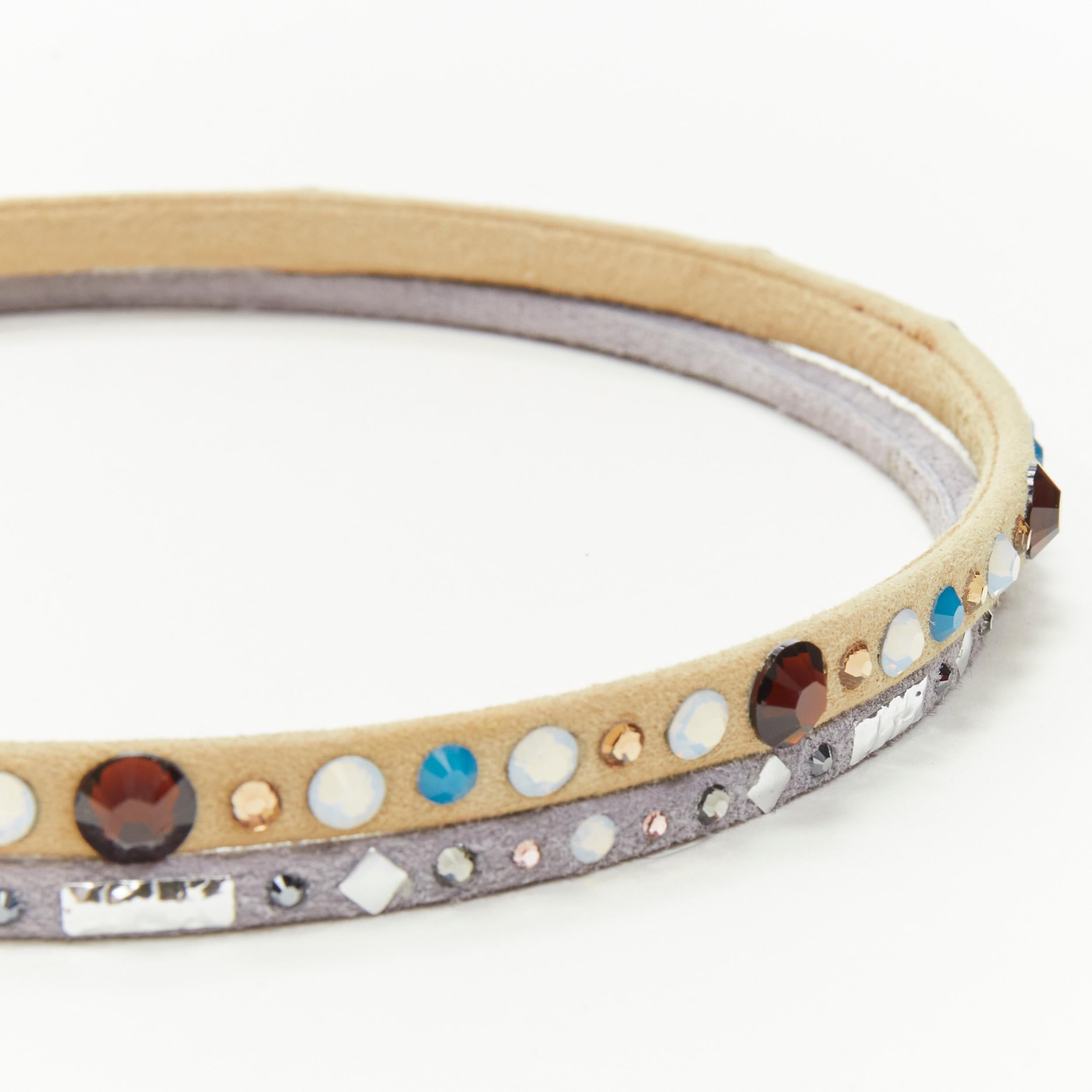 ALEXANDRE ZOUARI Bracelet skinny gris beige en daim coloré avec strass X2
Référence : ANWU/A00208
Marque : Alexandre Zouari
Designer : Alexandre Zouari
MATERIAL : Suède
Couleur : Beige, Grey
Motif : Solide
Fermeture : Tirer
Doublure :  Suède
Détails