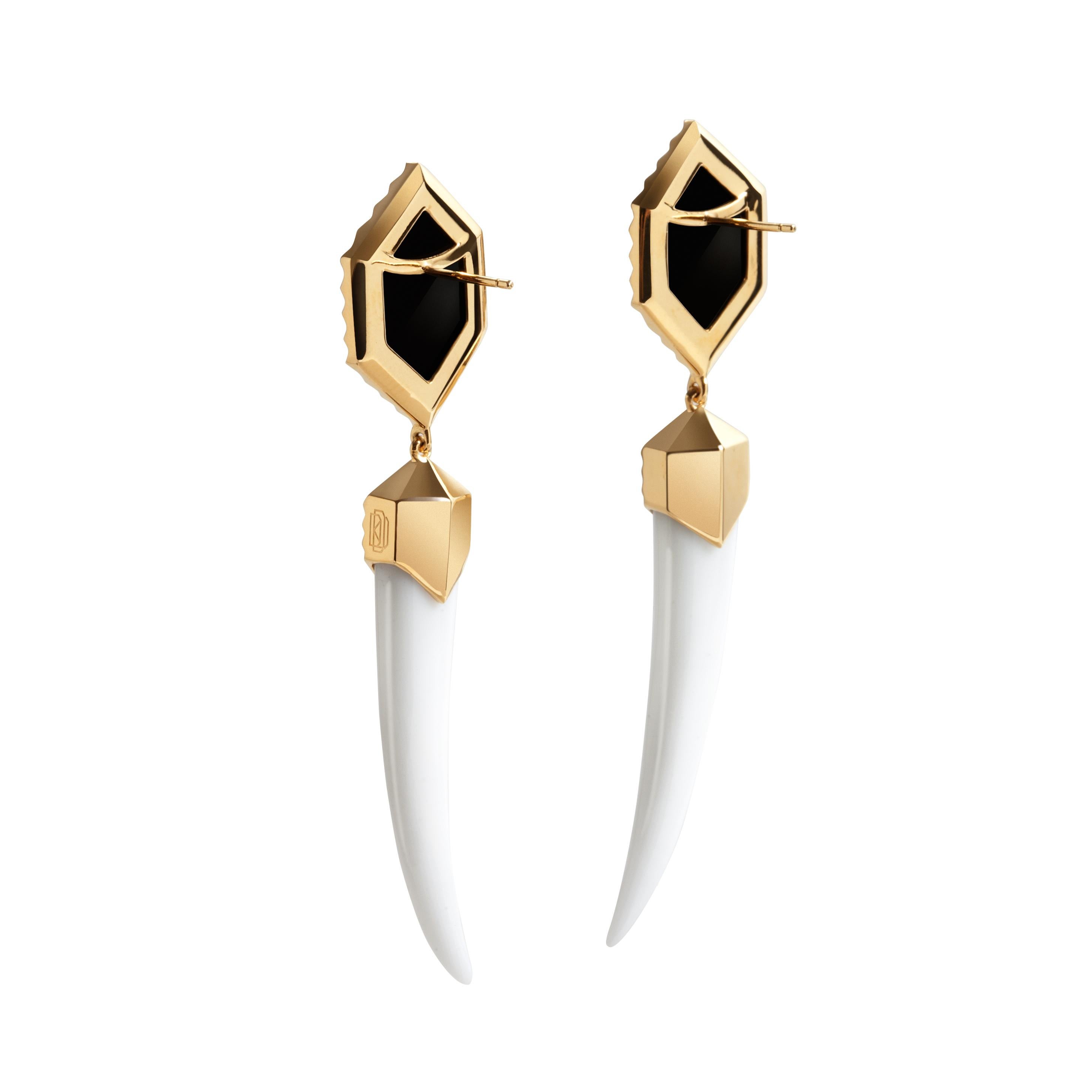 The Alexandria White Agate Horn Earrings by Angie Marei are a luxurious must-have statement piece for the jewelry lover. A powerful sensual design inspired by the art deco period and talismans worn by ancient Egyptians. Exquisitely crafted in