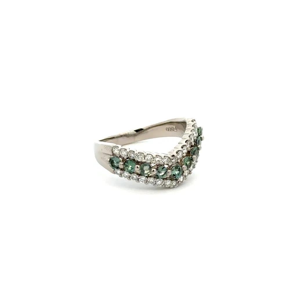 Simply Beautiful! Elegant and finely detailed, Alexandrite and Diamond V design Platinum Vintage Band Ring. Securely Hand set in V design with Alexandrite, weighing approx. 0.50tcw. Surrounded by Round Brilliant Cut Diamonds, 0.45tcw. Measuring
