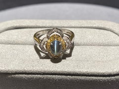 Anello con alessandrite occhio di gatto e diamante in oro bianco 18 carati