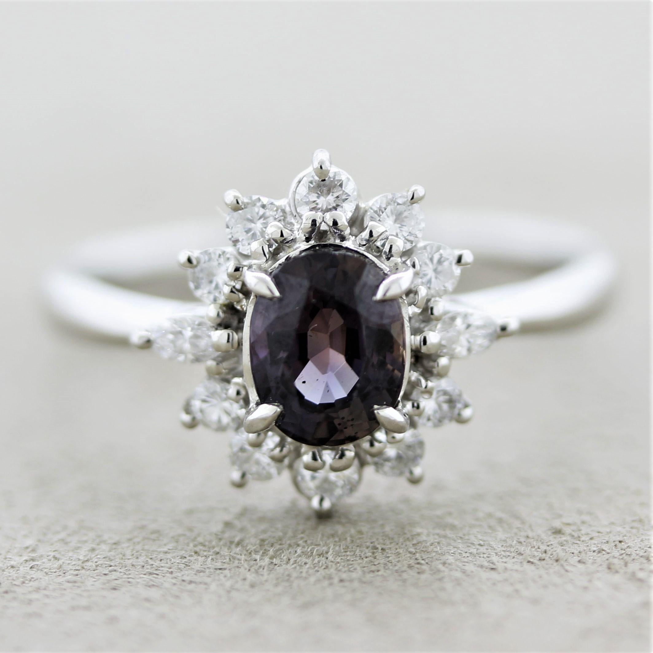 A mesmerizing and rare alexandrite, weighing 1.18 carats, takes center stage of this platinum made ring. The alexandrite has an oval-shape along with great color-change as the color changes from a greenish to a purplish color in different light
