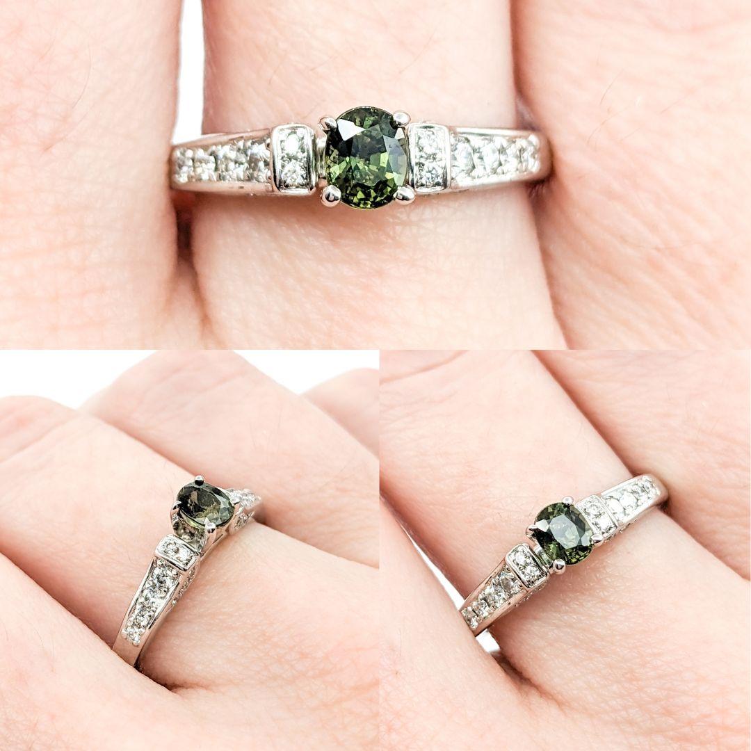 Alexandrite & Diamond Ring In White Gold

Introducing this beautiful ring, crafted in 14kt white gold, featuring a .46ct oval cut, green to pink color-change Alexandrite (GIA certified). Complementing the main gem are additional diamonds totaling