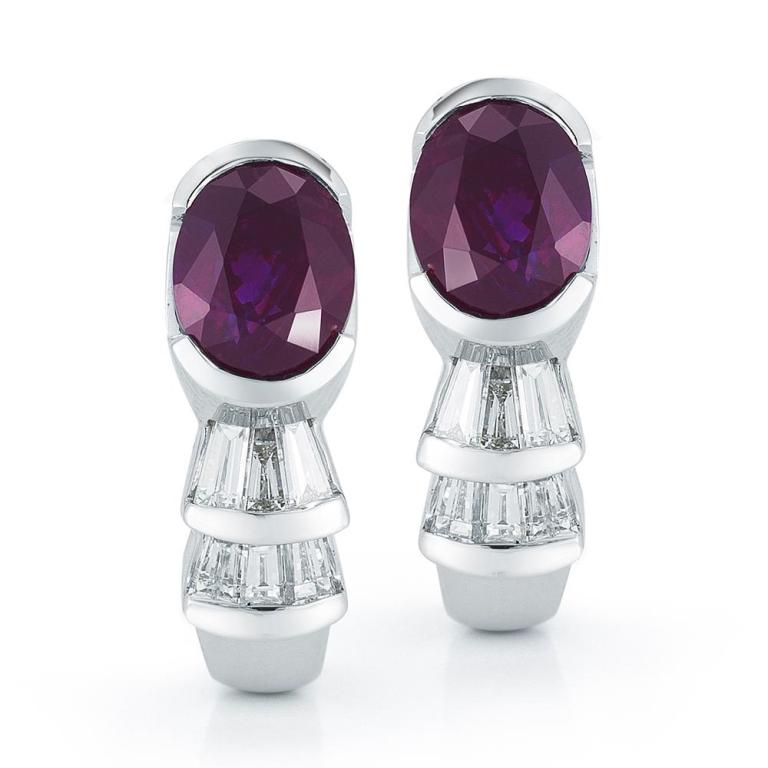 ALEXANDRITE EARRING WITH DIAMONDS An exceptional matched pair of color changing Alexandrites deliver a striking presence in simple diamond settings Item: # 01680 Metal: 18k W Lab: Gia Color Weight: 3.52 ct. Diamond Weight: 0.60 ct.
