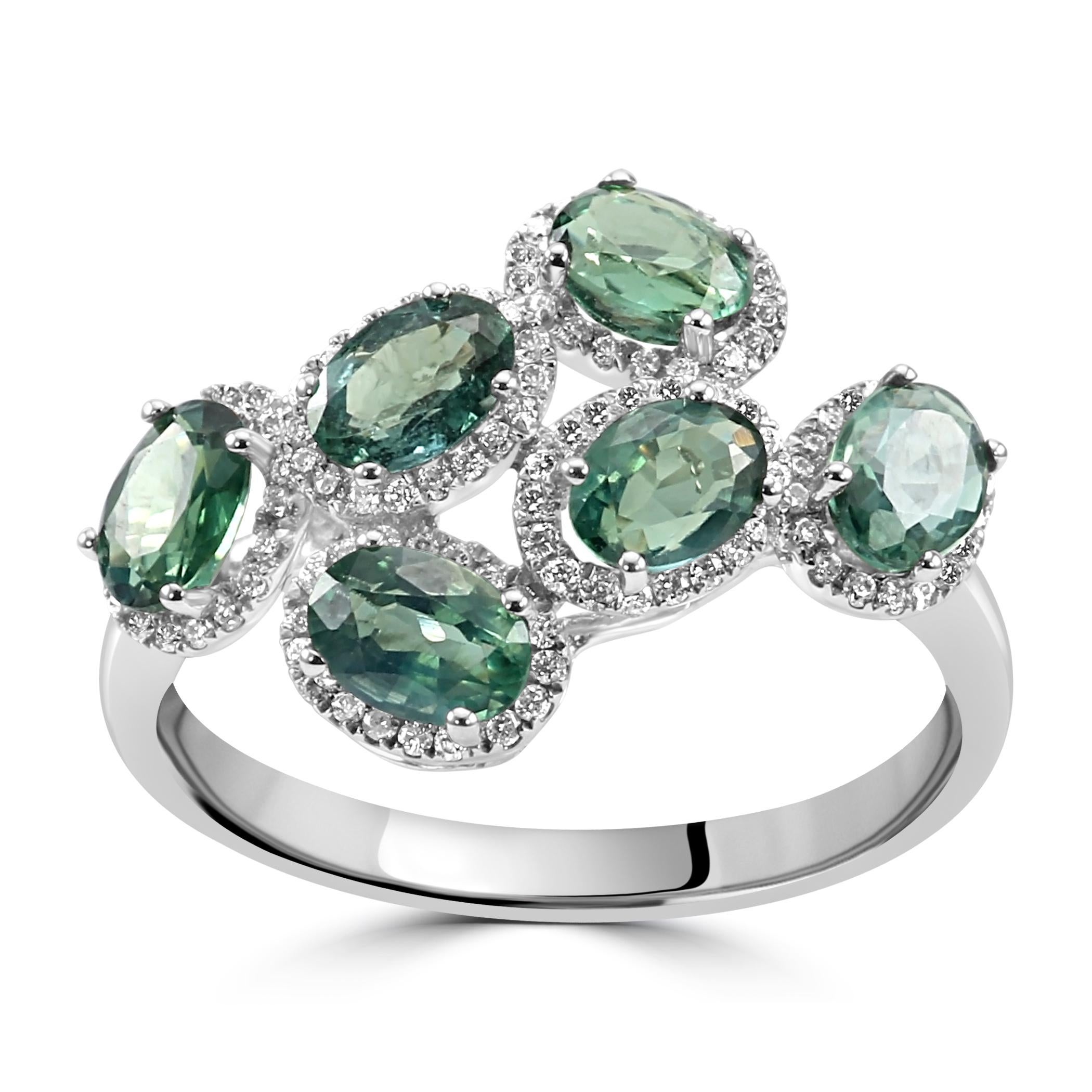 The star of this ring are the six Alexandrite Ovals, each boasting its unique color-changing properties. With a combined weight of 2.21 carats, these gems showcase a delightful interplay of hues, transitioning from vibrant greens to purples under