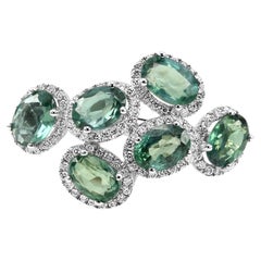 Alexandrite Oval White Diamond Round 18 Karat Gold Fashion Cocktail Halo Ring