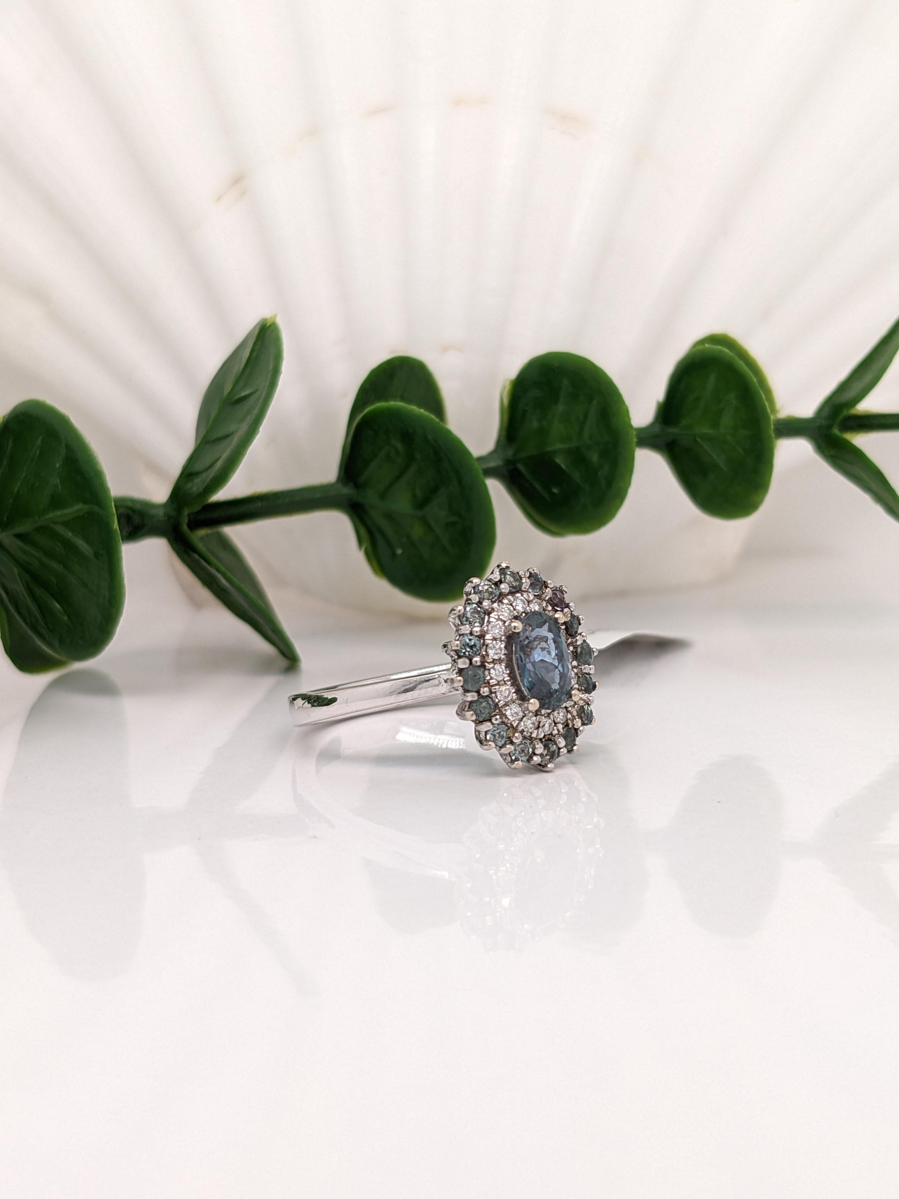 This ring features 17 gorgeous natural color-changing alexandrites! This unique double halo creates an over the top ring in 14k solid white gold, a large oval cut alexandrite as the center stone. This color changing alexandrite is a green color in