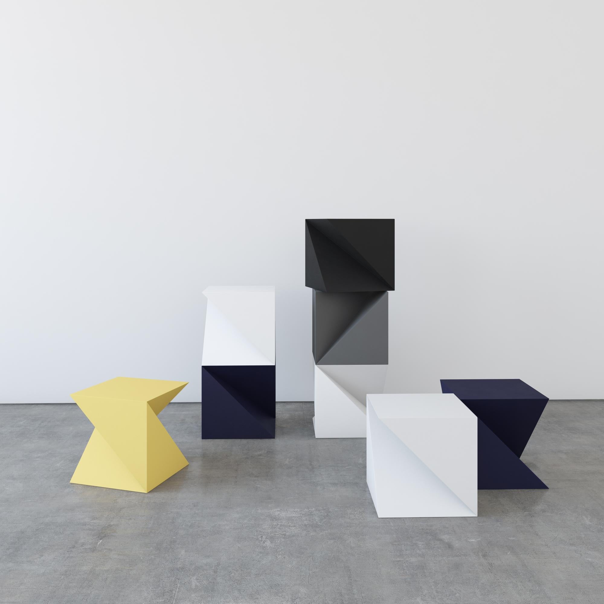 A multi-function object. 
Artist Alexey Krupinin

Its complex geometric shape is made of wood with a painted semi-gloss finish, creating unique silhouettes from different angles. You can use it as a side table, or stack a few of them to create a
