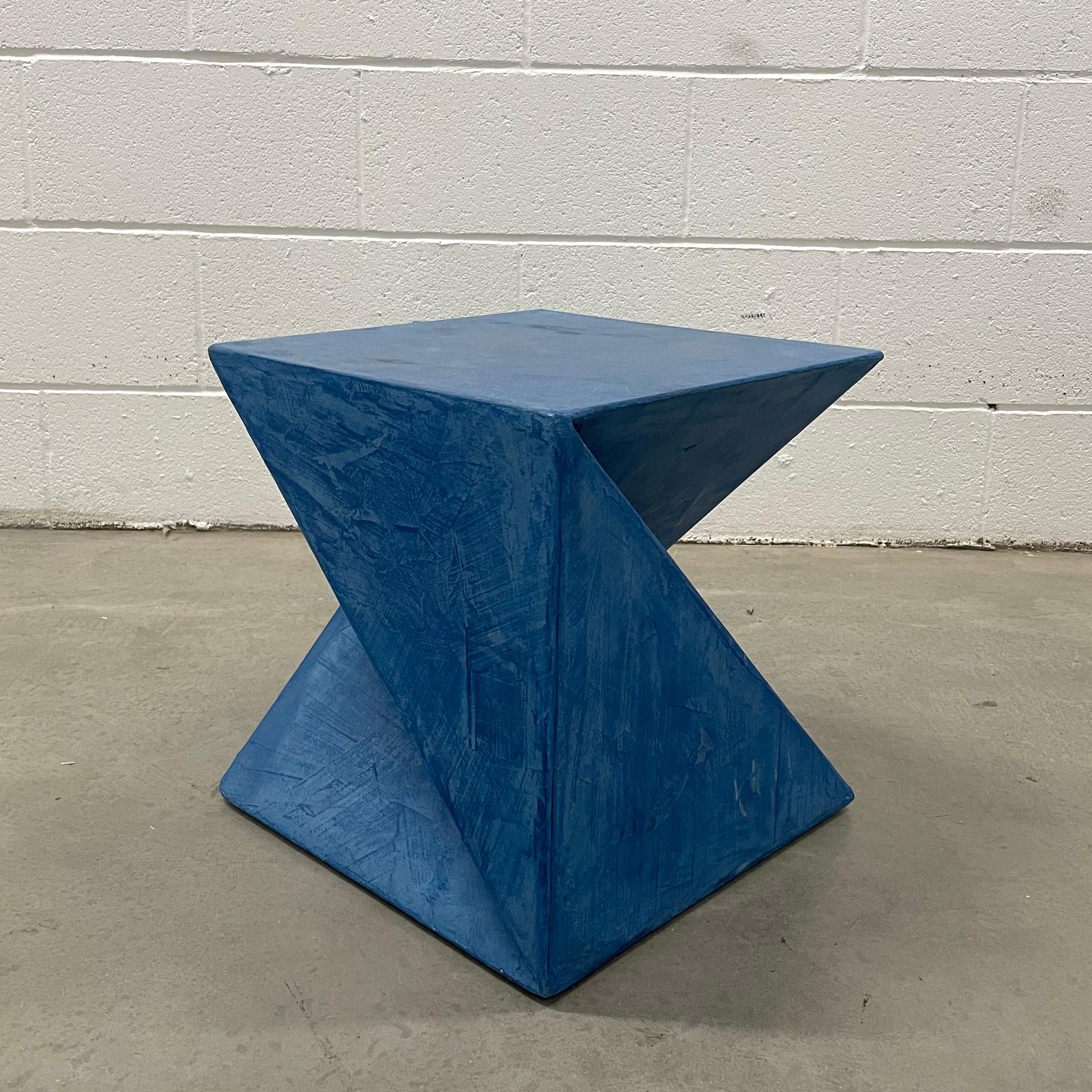 A multi-function Object. 
Artist Alexey Krupinin

Its complex geometric shape has a durable finish and is made of wood with multiple layers of hand-trowelled Venetian plaster, creating unique silhouettes from different angles. Tooling marks and