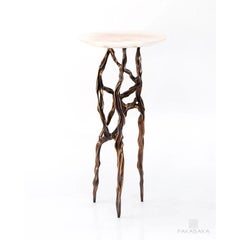 Tavolino Alexia con piano in onice di Fakasaka Design