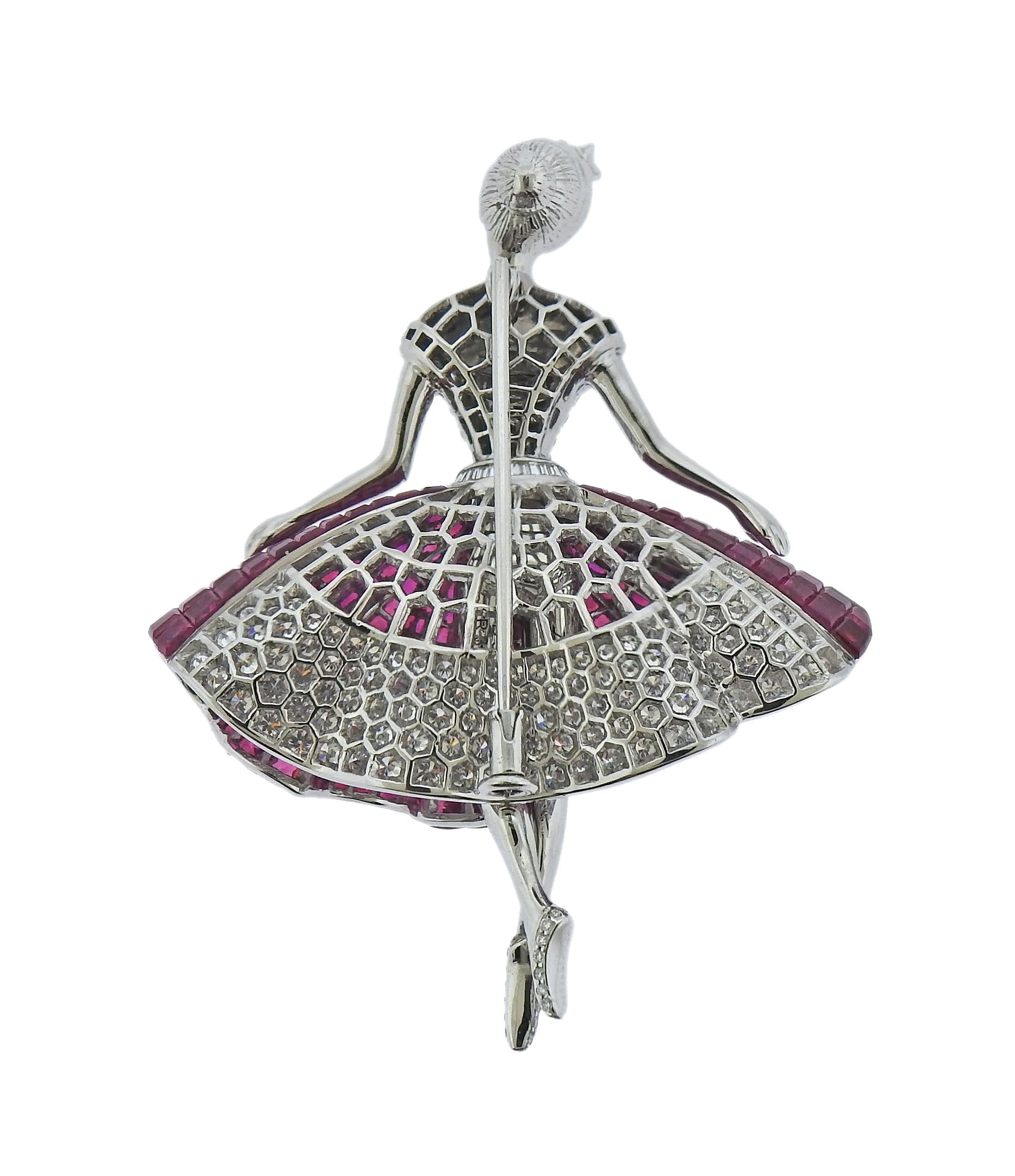 One of a kind, 18k white gold beautiful ballerina brooch by Alexis, with 30.88cts in invisible set rubies and 3.39ctw in diamonds. Brooch measures 2 3/8