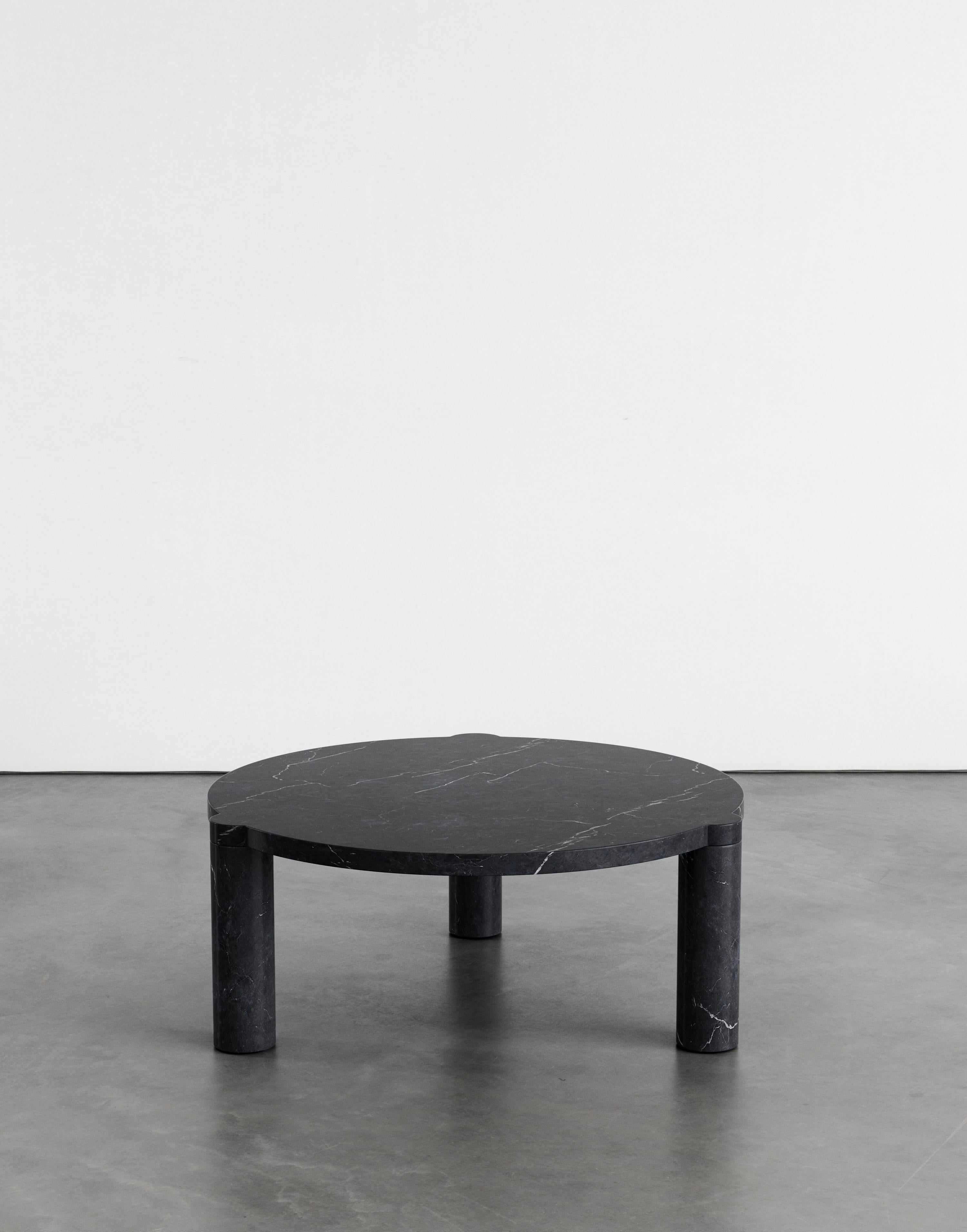 Alexis 80 coffee table by Agglomerati.
Dimensions: W 80 x H 33 cm. 
Materials: Black Marquina. Available in other stones. 

Agglomerati is a London-based studio creating distinctive stone furniture. Established in 2019 by Australian designer Sam