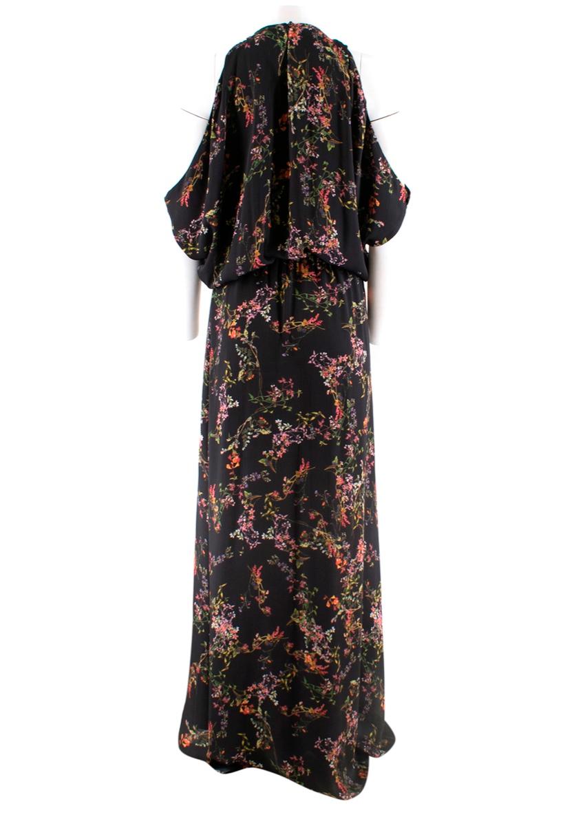 Wonderful floral patterned maxi dress from Alexis. Comes in a soft satin like material and features an elasticised waist and cut out shoulders.

- 100% Polyester 
- Dry clean only

Measurements are taken laying flat, seam to seam. 

Shoulders 38