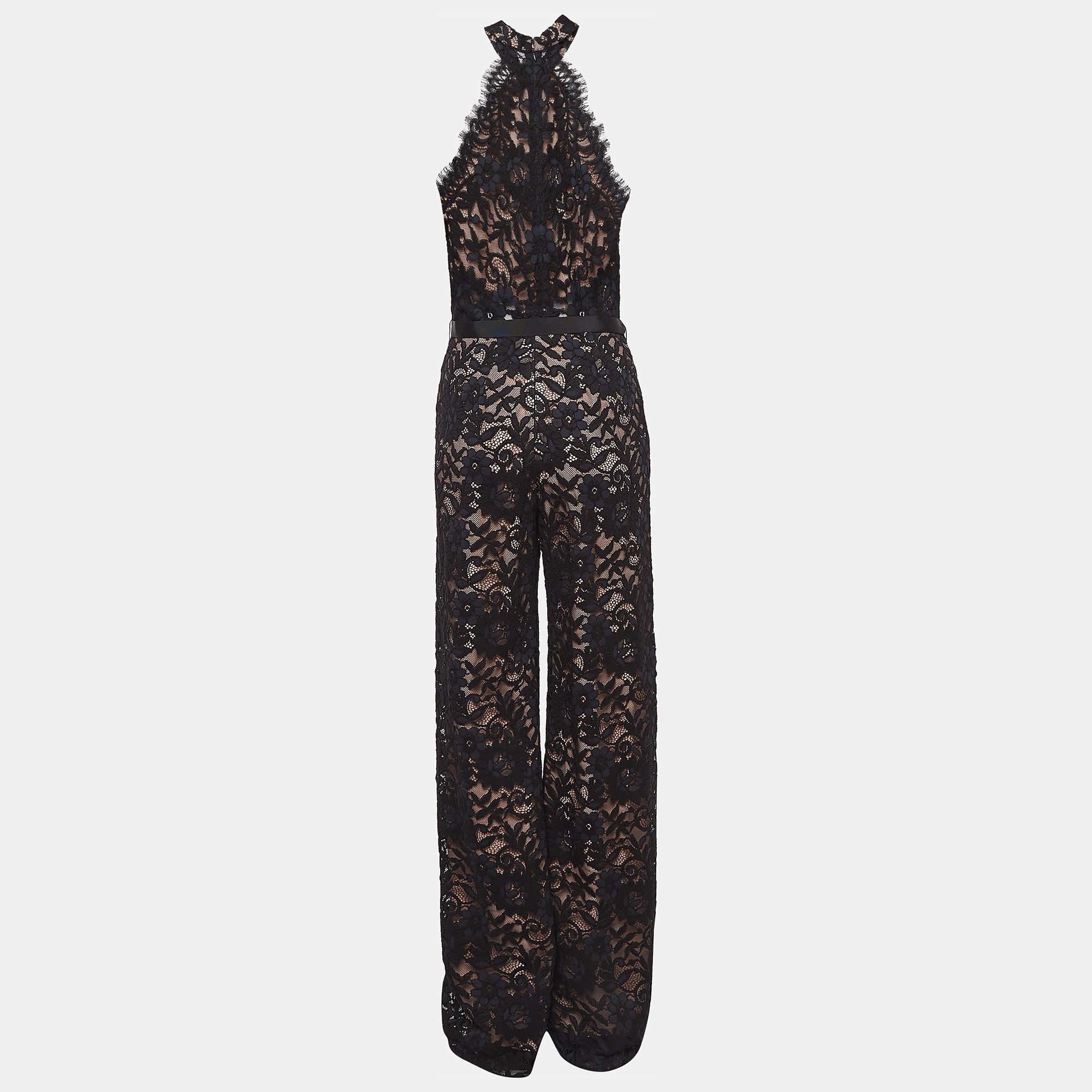 The Alexis jumpsuit is a blend of modern chic and timeless elegance. Crafted from intricate black lace  it features a sleek sleeveless design with a flattering fitted bodice and flowing trousers. Perfect for evening soirÃ©es  its delicate detailing