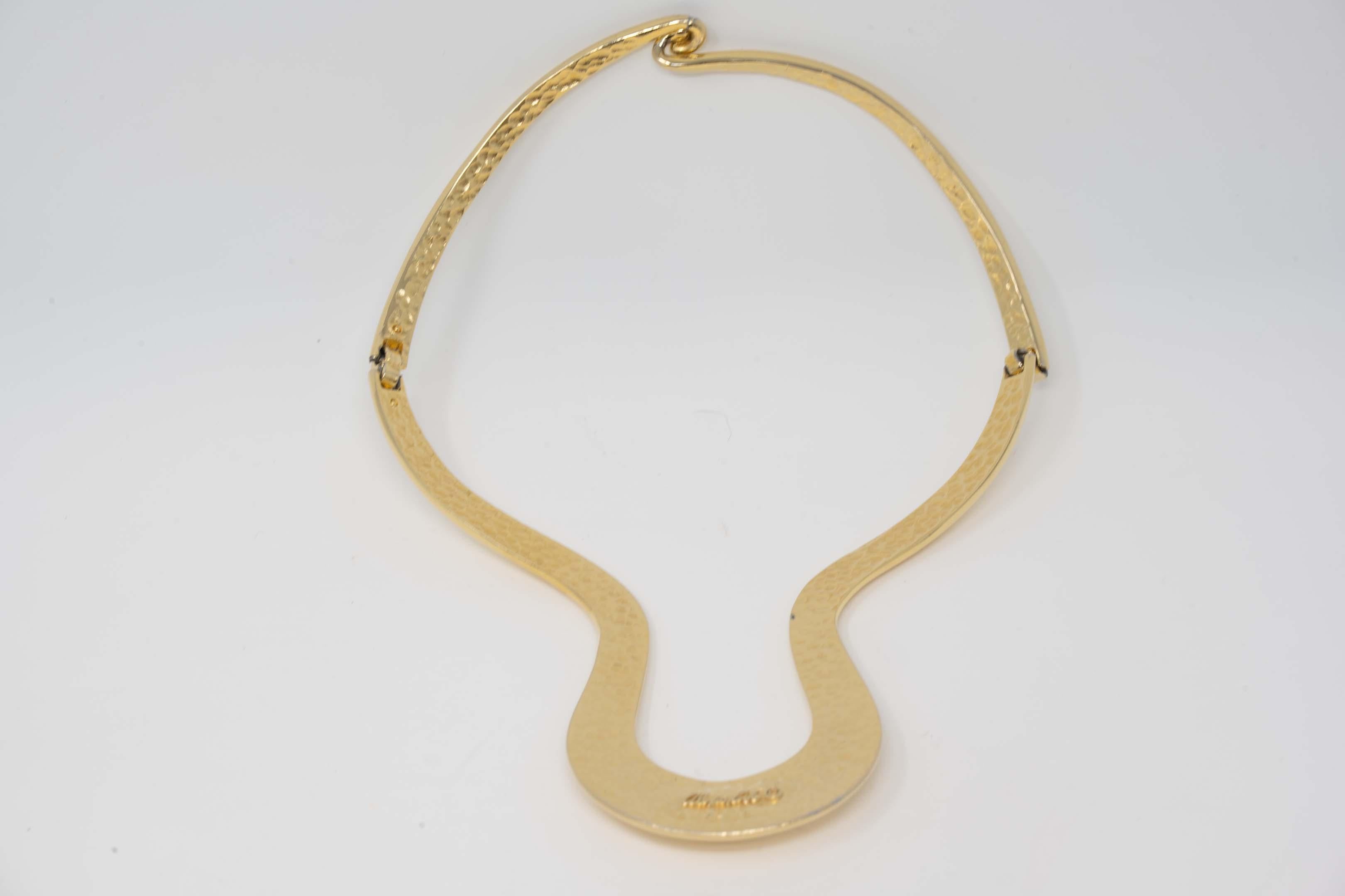 Vintage Alexis Kirk articulated gold tone choker necklace Made in New York, USA, circa 1980. Measures 16 inches around the neck, 8 inches long x 1 inch wide at the bottom. In good condition, wear is consistent with age, and preowned.