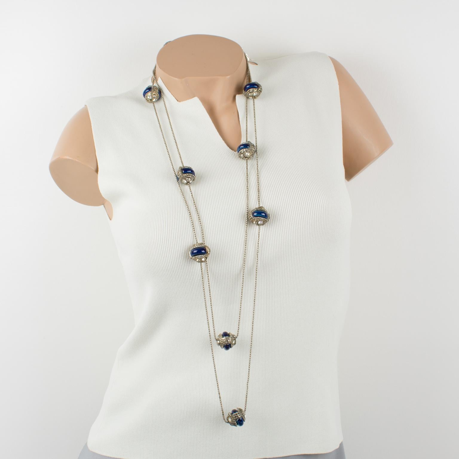 This stunning French designer Alexis Lahellec Paris extra-long necklace features an unusual piece of jewelry with an XXL long silvered metal chain. The chain necklace boasts silvered metal-coated resin beads with cobalt blue ceramic elements and