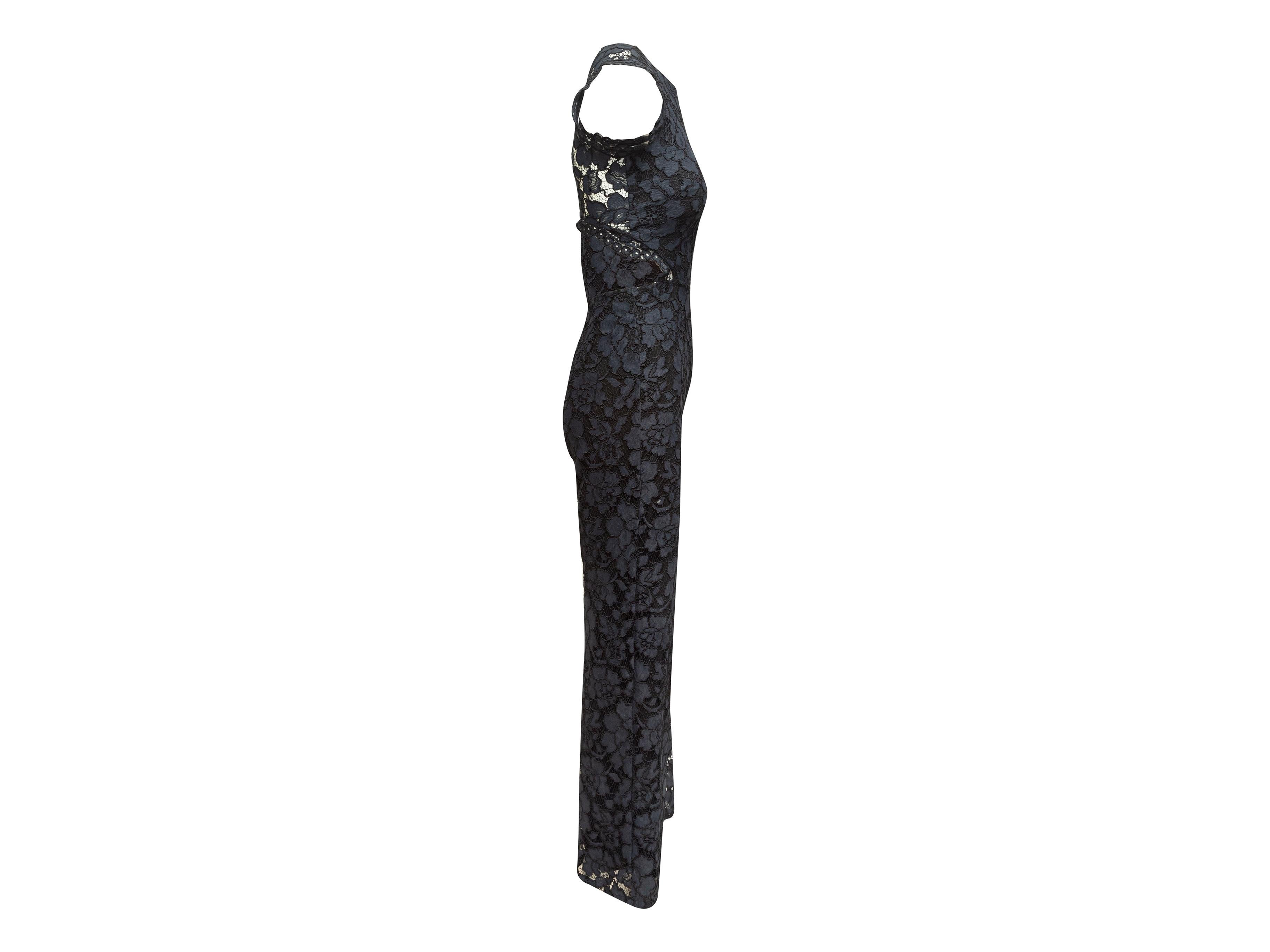 Product details: Navy blue and black lace sleeveless jumpsuit by Alexis. Crew neck. Zip closures at back. 26