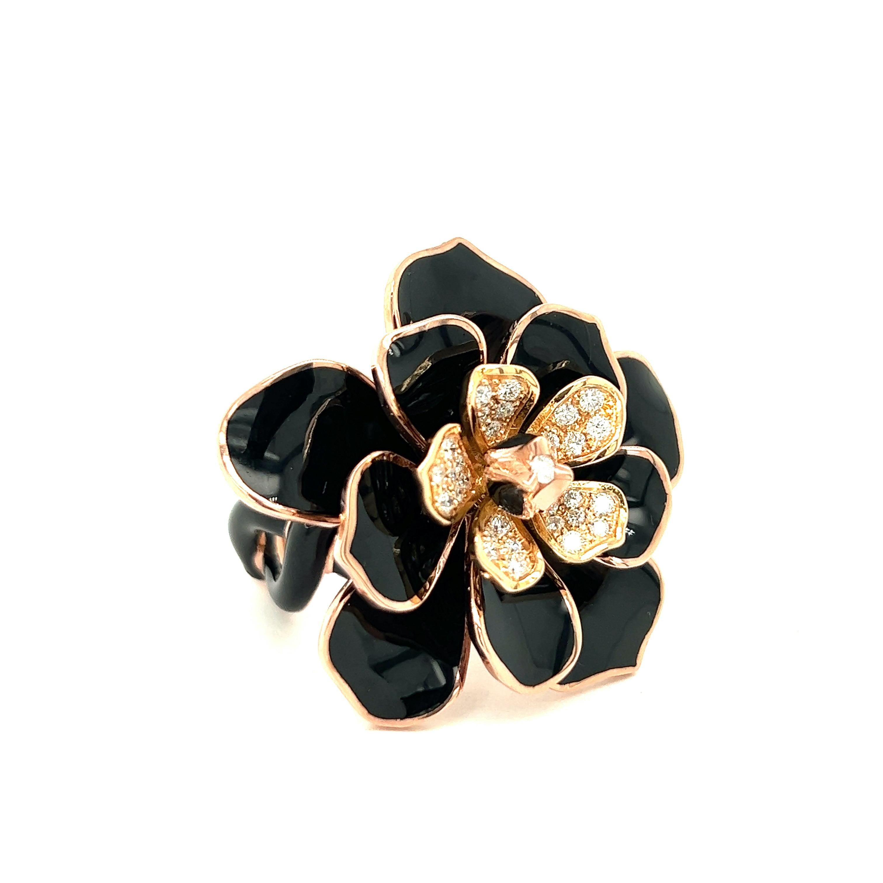 Alexis NY Black Enamel Flower Ring

Small round-cut diamonds of 1 carat, black enamel, set on 18 karat rose gold and sterling silver; marked Alexis NY, 750, 925

Size: 7.5 US; top width 3.5 cm
Total weight: 22.5 grams