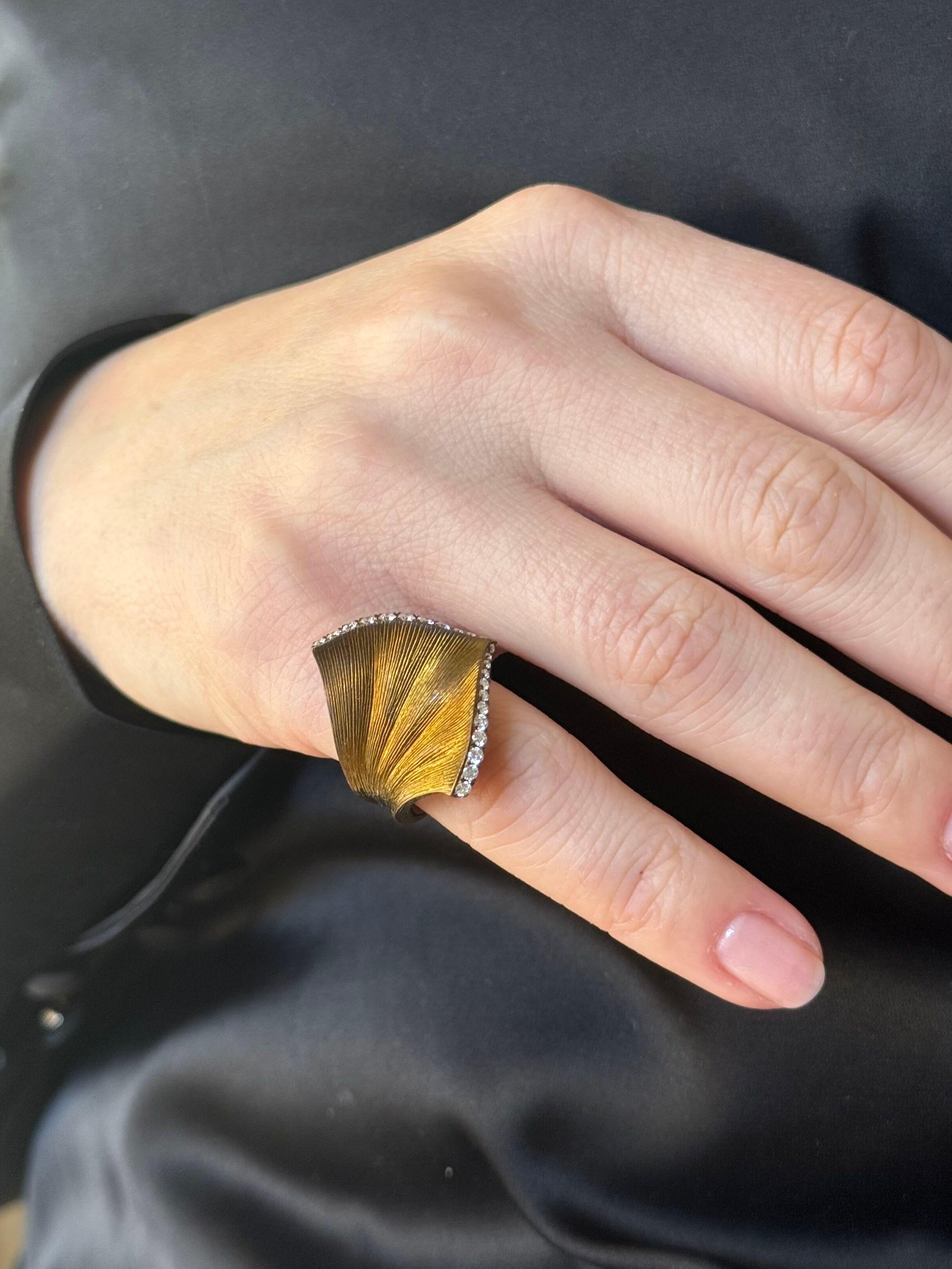 Golden color titanium leaf motif ring by Alexis New York, with 0.41ctw G/VS diamonds. 
Ring size 5.5, top is 1