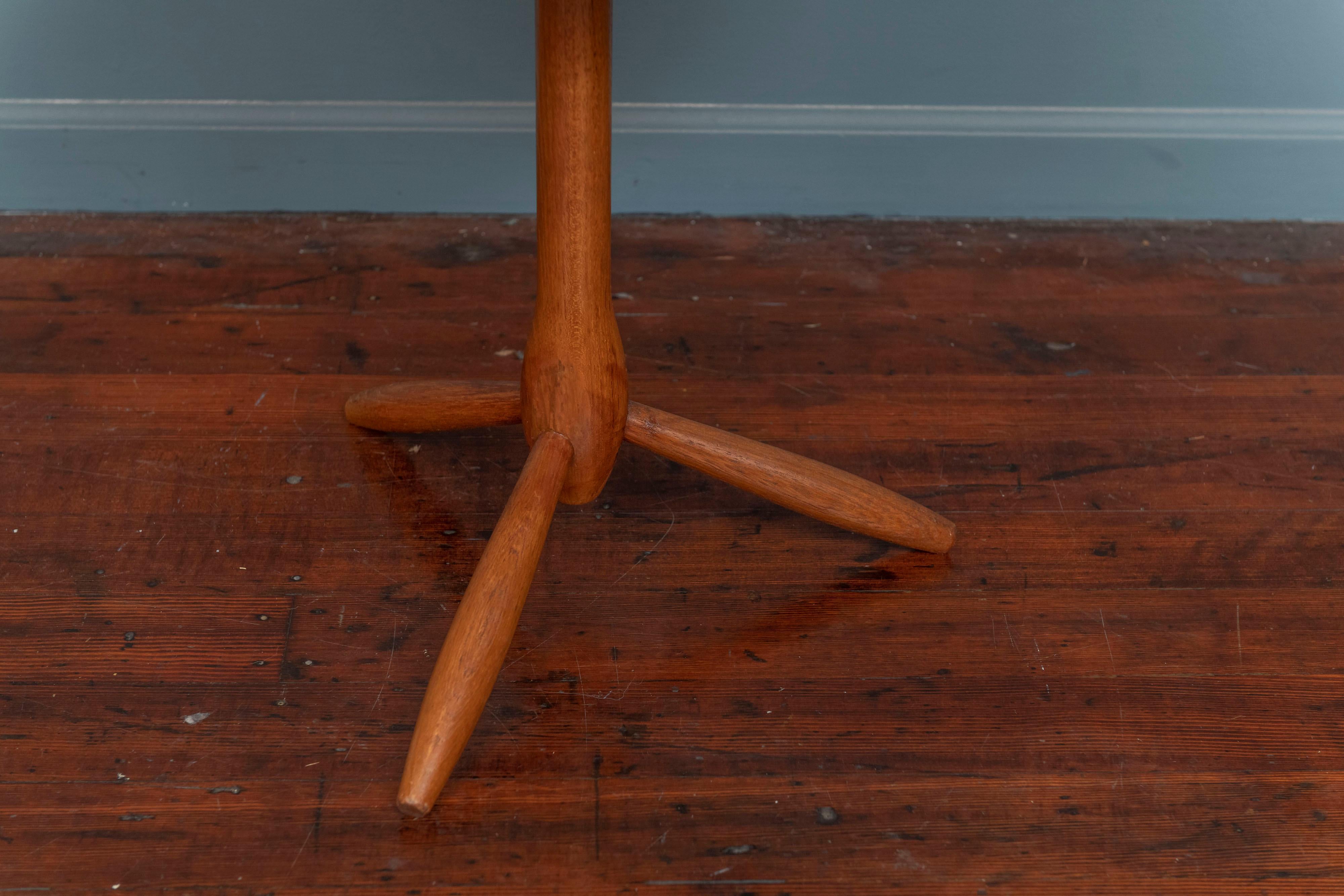 Alf Sture design solid teak side table with a tripod base and turned lip. Interesting form, labeled.