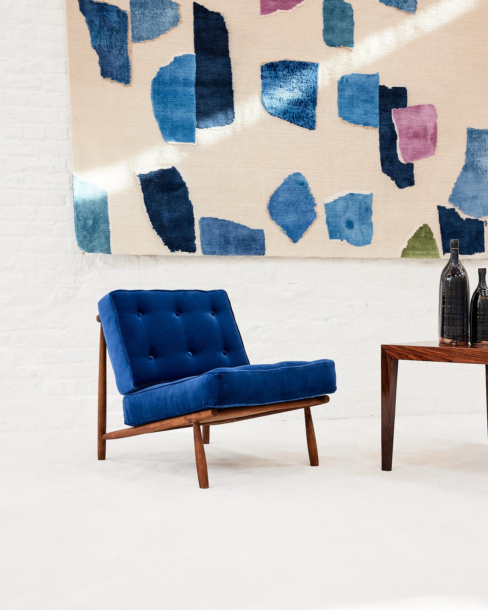 Model “Domus” designed by Alf Svensson. Sweden, 1960s, DUX production. A clean and Minimalist chair, first presented in 1952 by Alf Svensson. The low-profile beechwood frame features newly reupholstered velvet cushions in a speckled electric blue