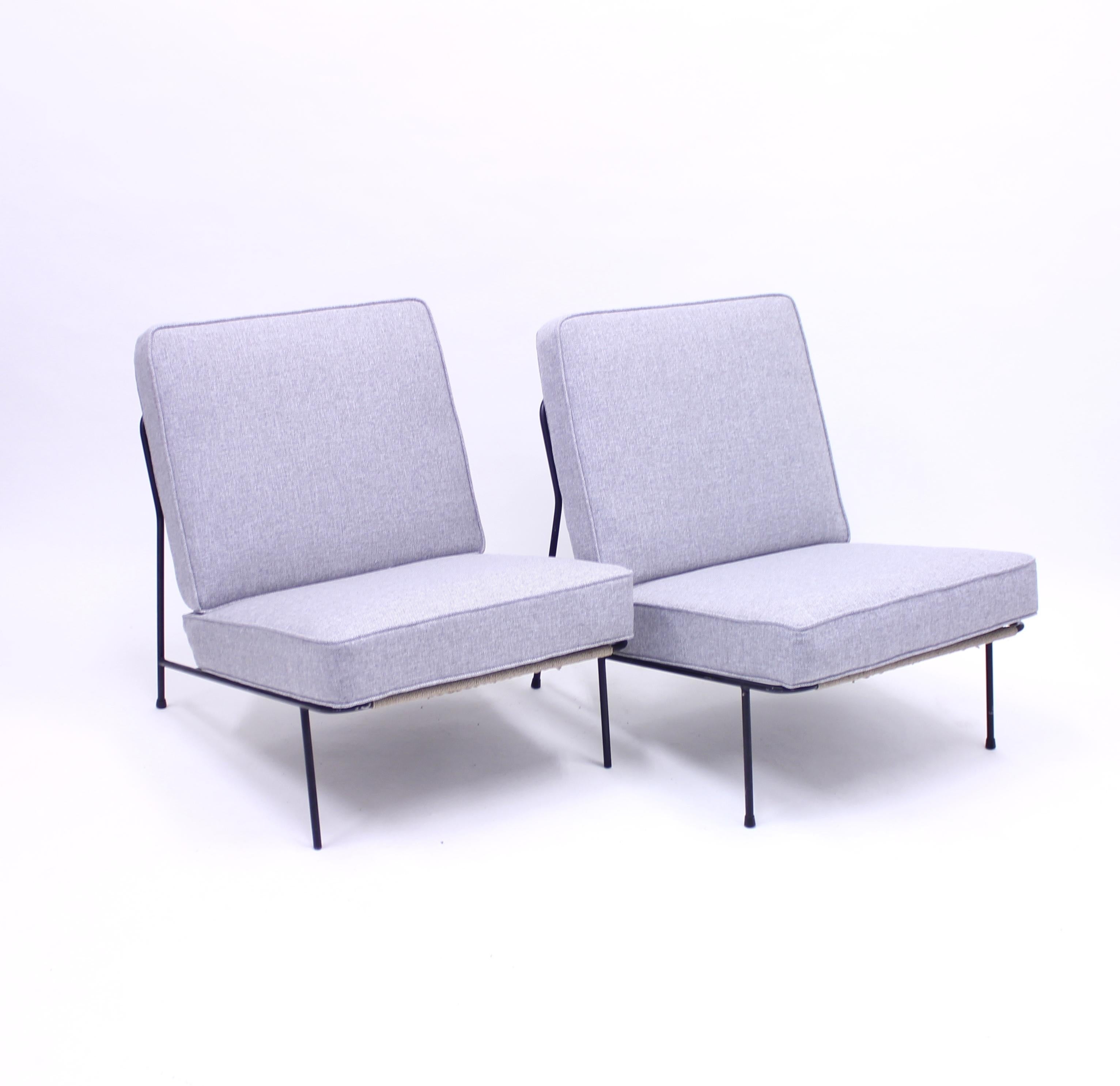 Pair of lounge chairs designed by Alf Svensson for DUX / Ljungs Industrier and their furniture line Bra Bohag in the 1950s. The model was shown at the very well known H55 exhibition in 1955 in Helsingborg, Sweden which is one of the highlights of