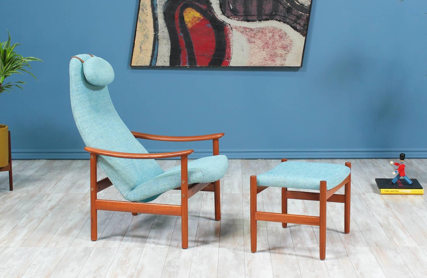 Lounge Chair with Ottoman designed by Alf Svensson for Ljungs Industrier in Sweden circa 1960’s. Newly reupholstered in a beautiful aquamarine blue tweed fabric, this chair features a teak wood frame with sculptural armrests. The back is molded to