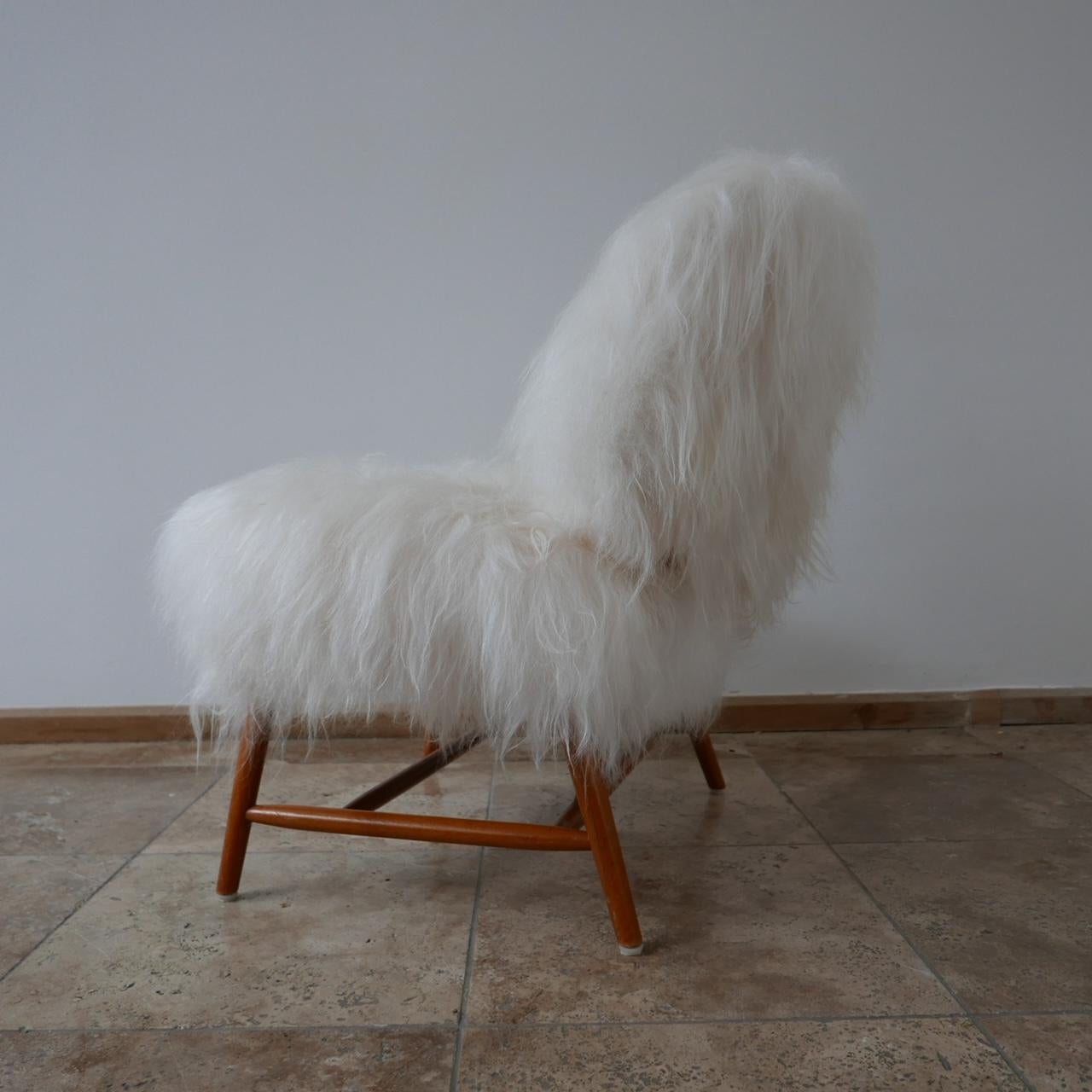 Suédois Alf Svensson 'TeVe' Chaise longue en peau de mouton et shearling en vente