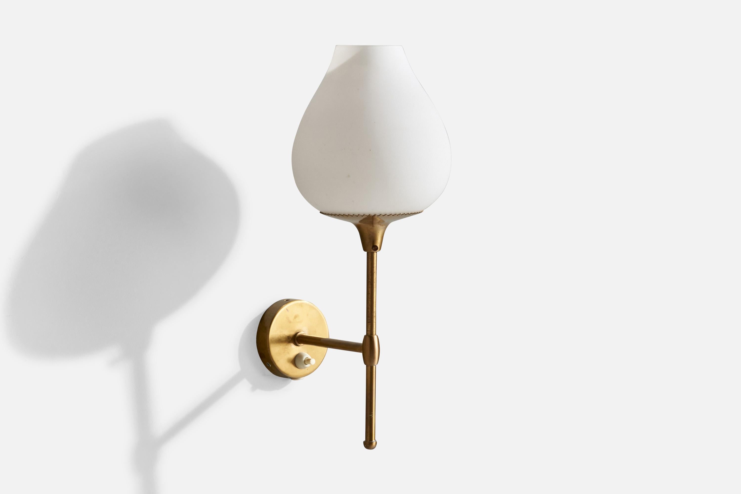 A brass and white opaline glass wall light designed by Alf Svensson and produced by Bergboms, Sweden, c. 1960s.

Overall Dimensions (inches): 15” H x  6.5” W x  7.5“D

Back Plate Dimensions (Inches):  3” H x 3” W x .75” D

Bulb Specifications: E-26