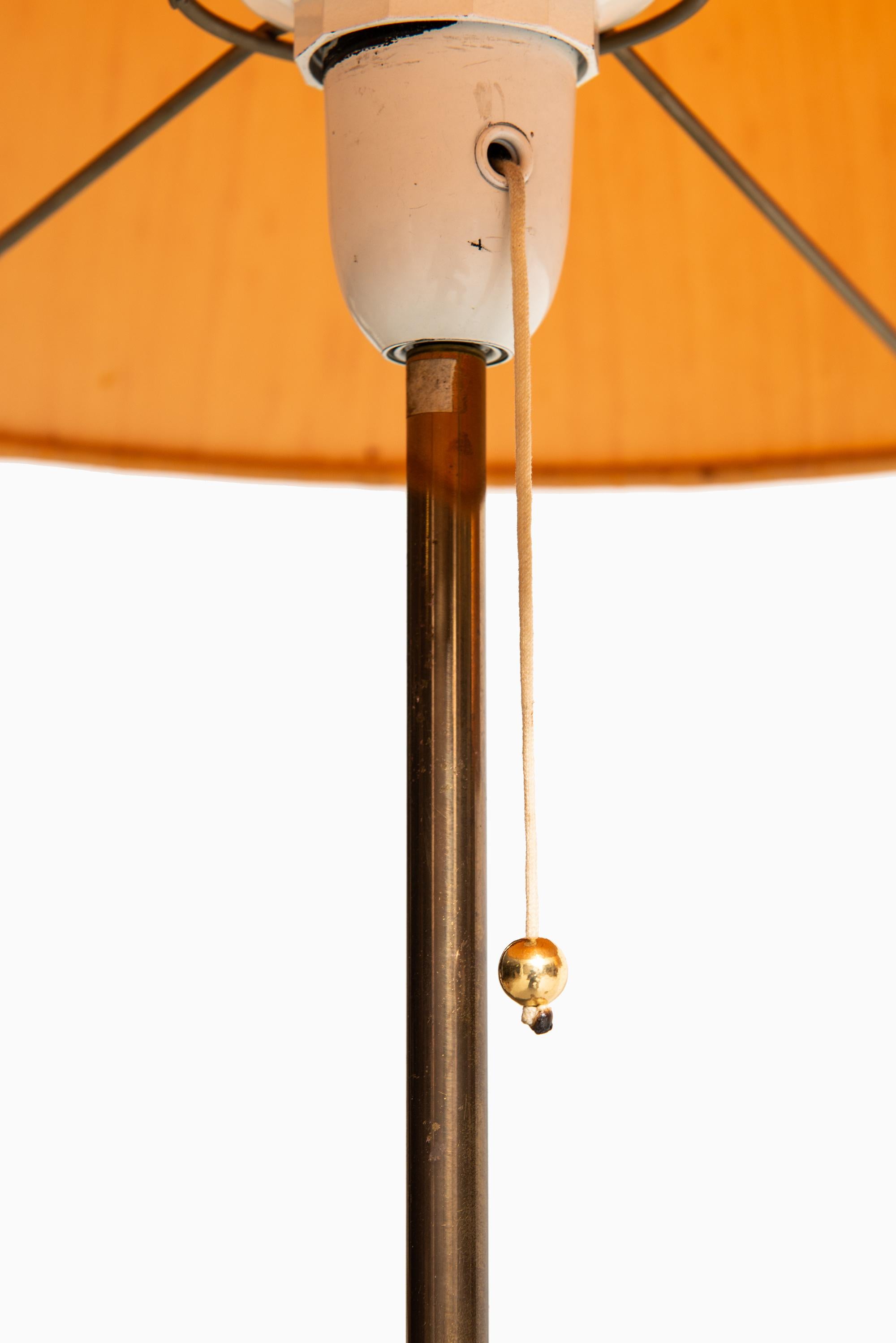 Rare pair of floor lamps model G-024 designed by Alf Svensson & Yngvar Sandström. Produced by Bergbom in Sweden.