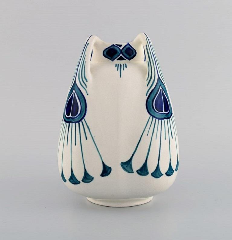 Alf Wallander for Rörstrand. Vase with four handles in hand painted glazed ceramics.
Early 20th century.
Measures: 18.5 x 13 cm.
Stamped.
In excellent condition.