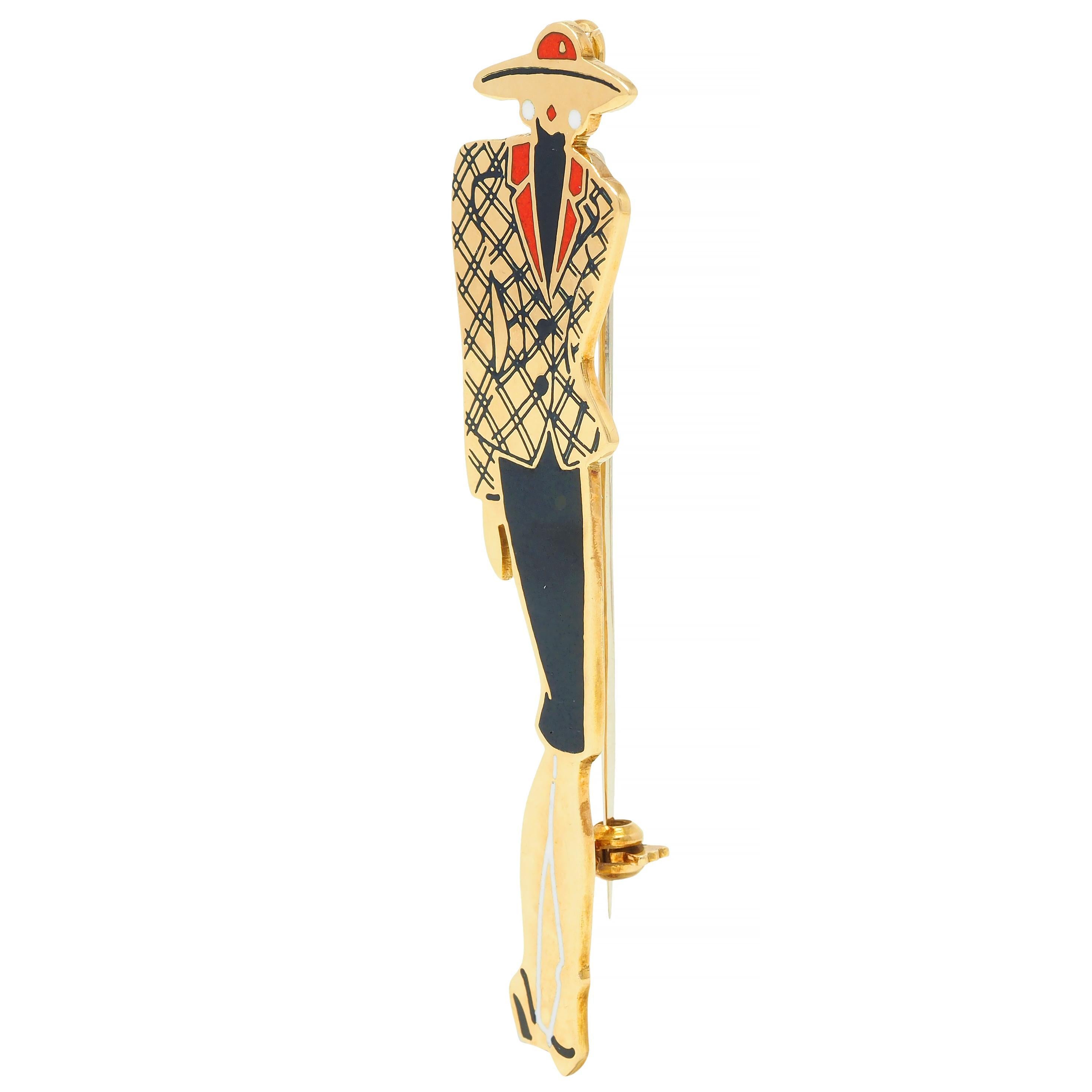 Designed as a gold brooch depicting a stylish woman with pencil skirt, plaid blazer, wide hat, and earrings 
Decorated with graphic enamel - opaque glossy white, red, and black 
Exhibiting minimal loss - with high polish finish
Completed by