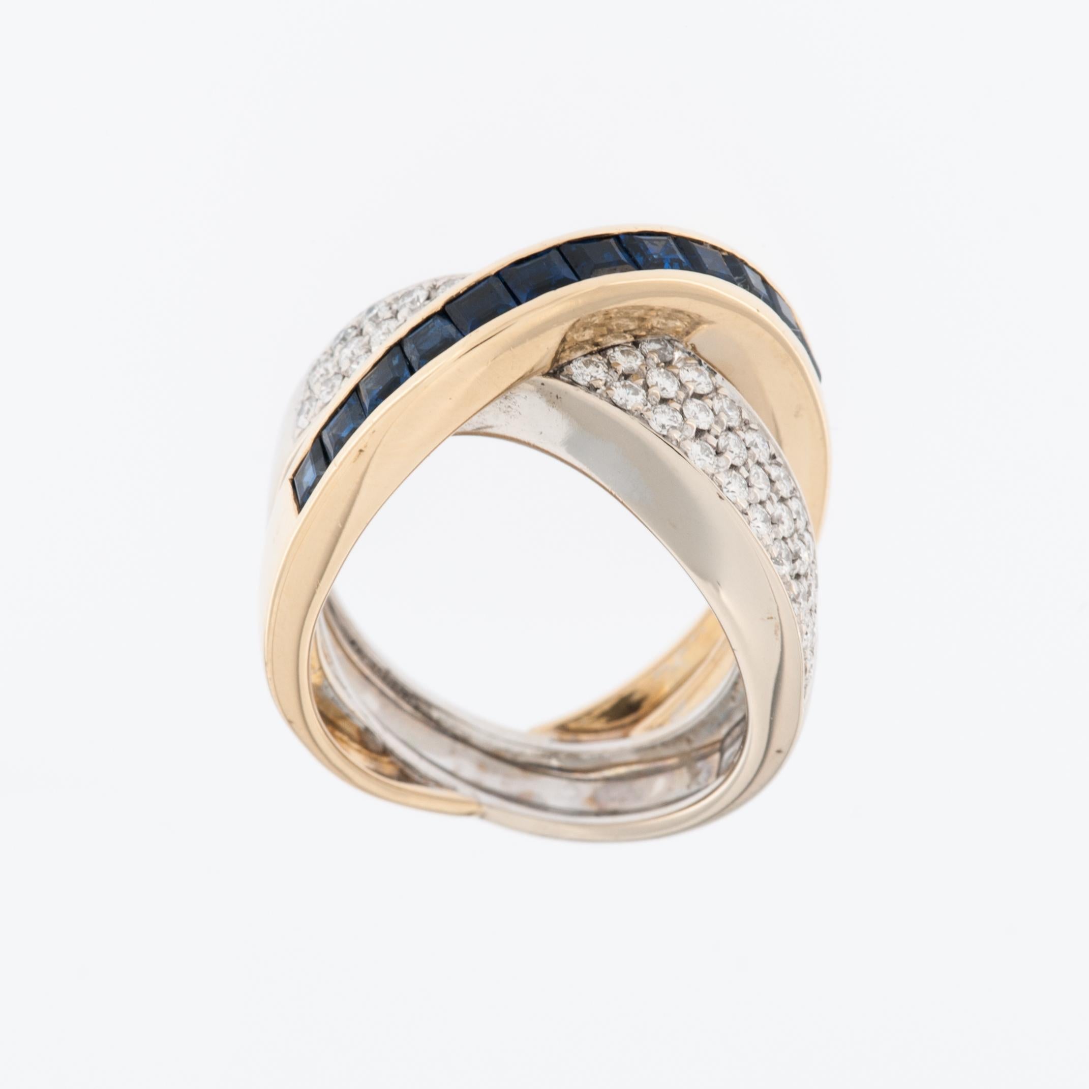 The ALFIERI & ST. JOHN Diamond and Sapphire 18kt Gold Ring is a luxurious and exquisite piece of jewelry designed to adorn the wearer's finger with elegance and sophistication. 
The ring is crafted from 18-karat yellow and white gold, which is known