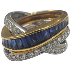 Retro Alfieri & St John Invisibly Set Sapphire and Diamond Crossover Ring