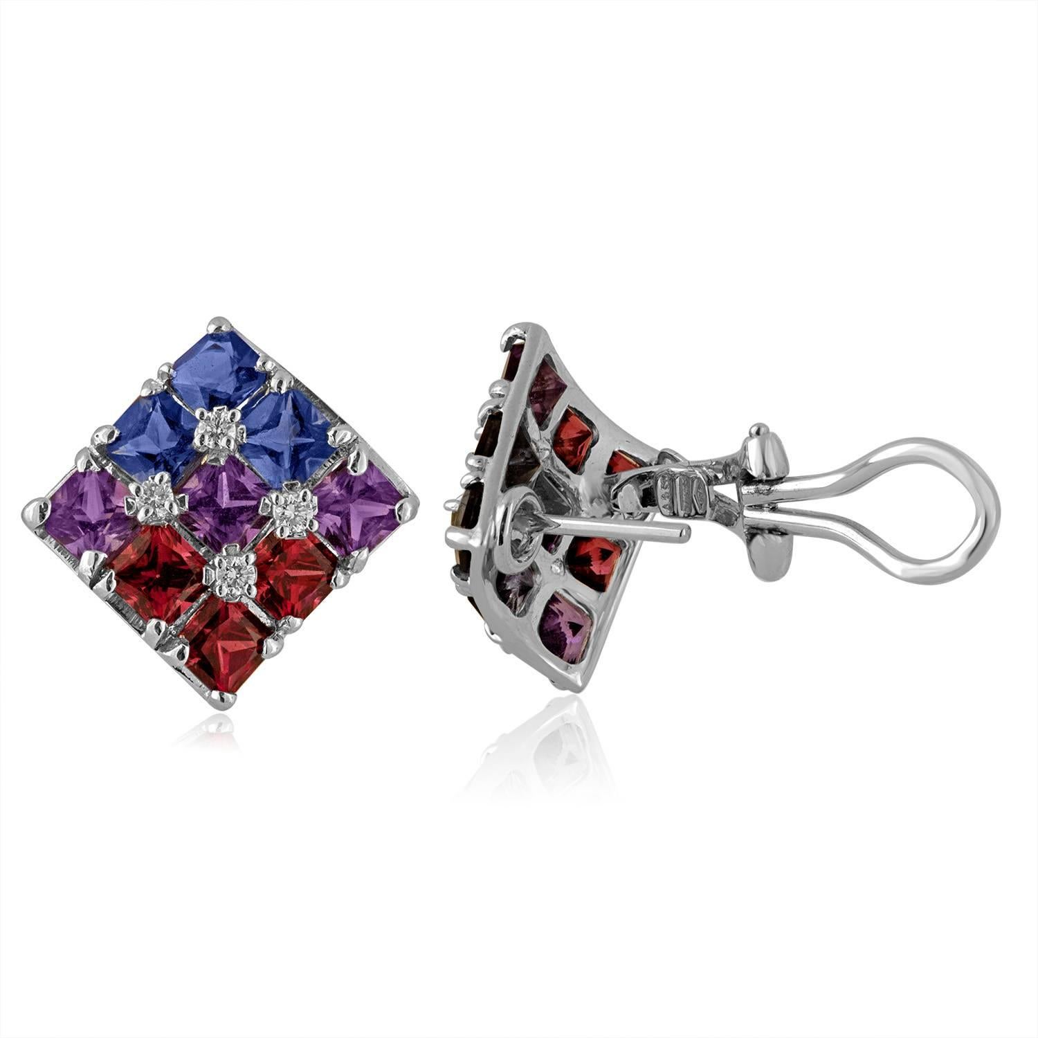 Beautiful Earrings & Ring Set by Alfieri & St. John.
The earrings are 18K White Gold.
There are 0.20 Carats In Diamonds.
There are 1.00 Carats in Garnets.
There are 1.00 Carats in Amethyst.
There are 1.00 Carats in Iolite.
The earrings measure 0.75