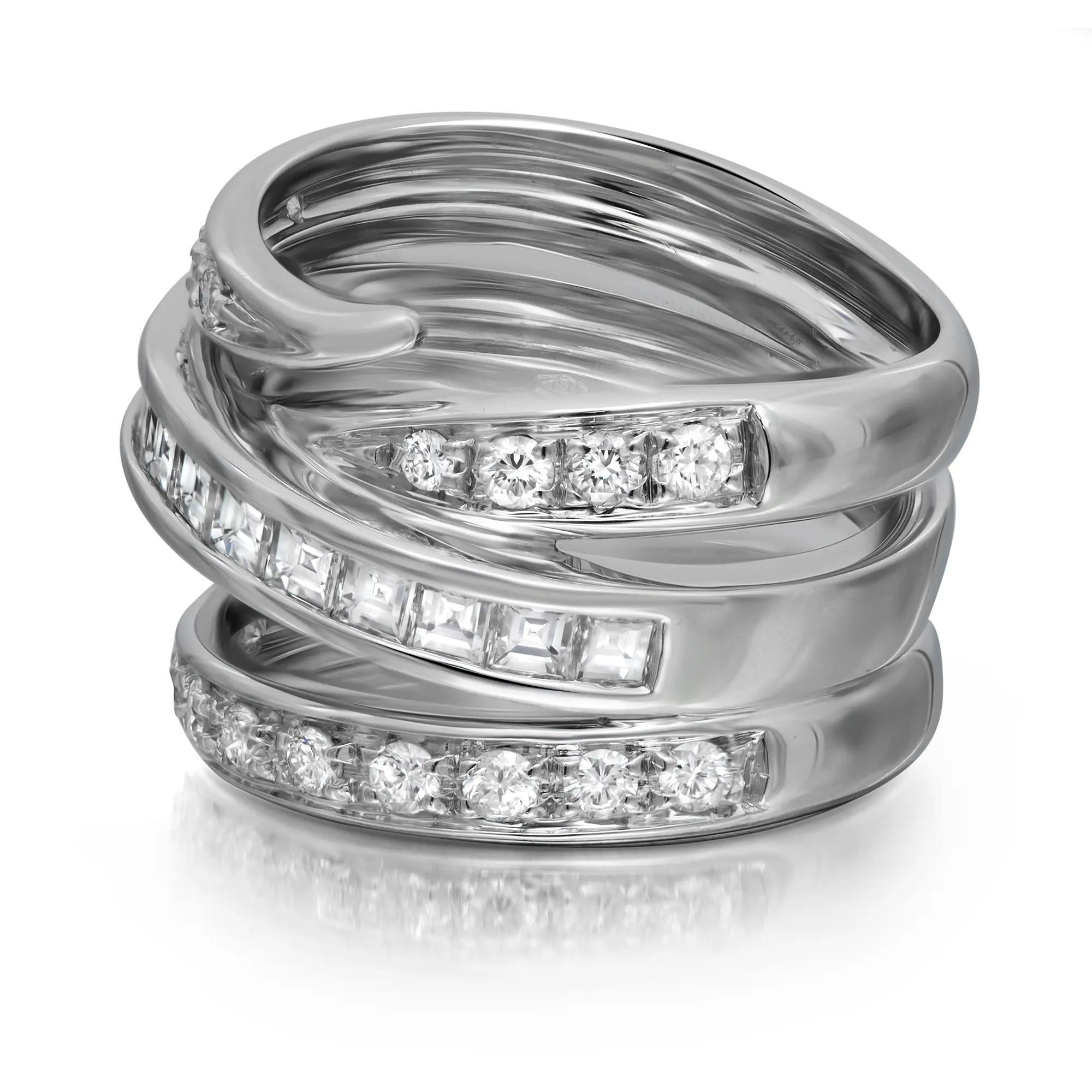 This gorgeous Alfieri St. John multi band diamond ring is all about sparkle and glamour. This ring exceptionally showcases channel set princess cut diamonds on the center band with pave set round cut diamonds encrusted in multi rows forming a wide