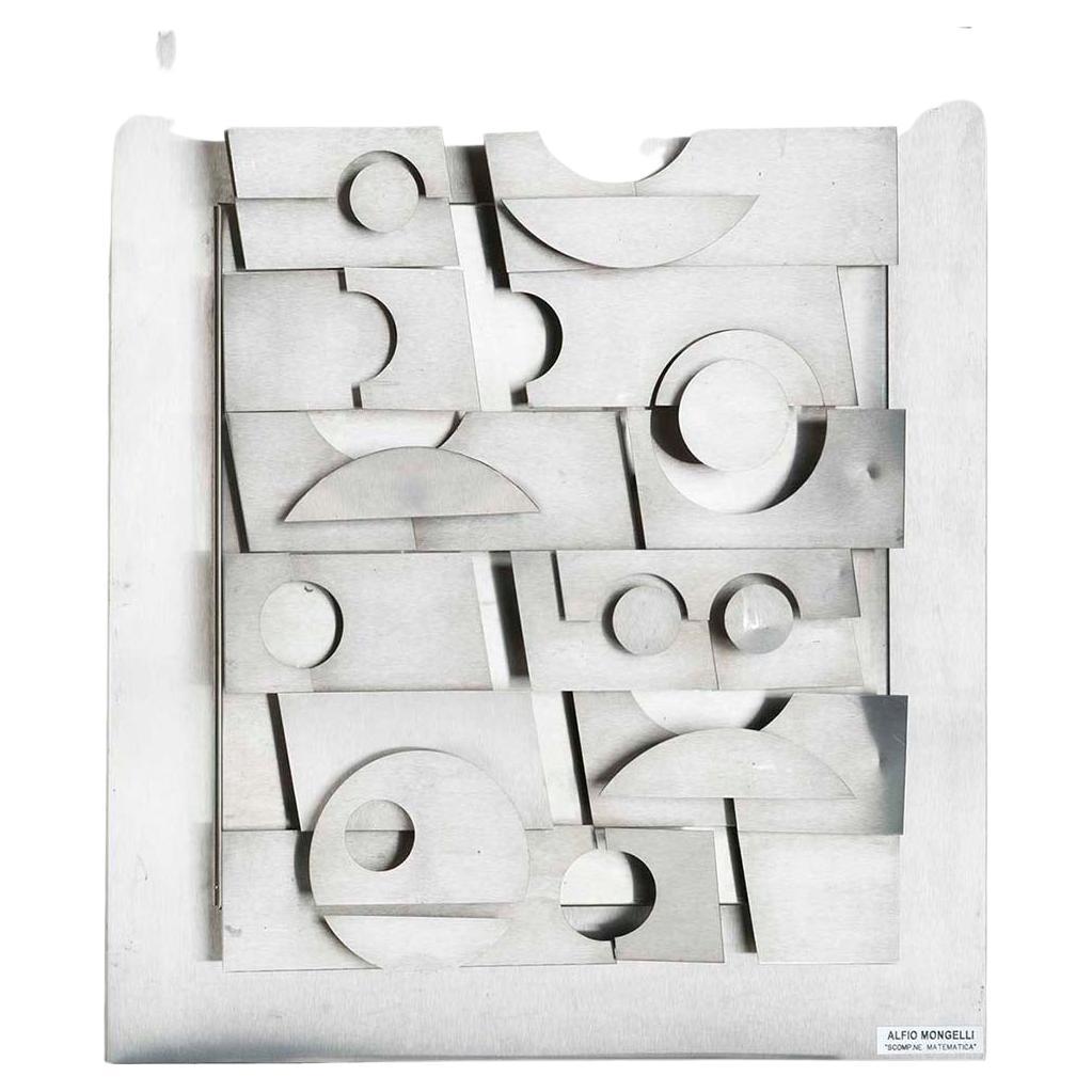 Alfio Mongelli (Rome 1939)

Scomposizione Matematica - ABC
75,3 x 65,5 x 10 cm
acier et bois
1980

Sculpture en acier sur bois ; étiquette indiquant le titre et l'auteur en bas à droite.
