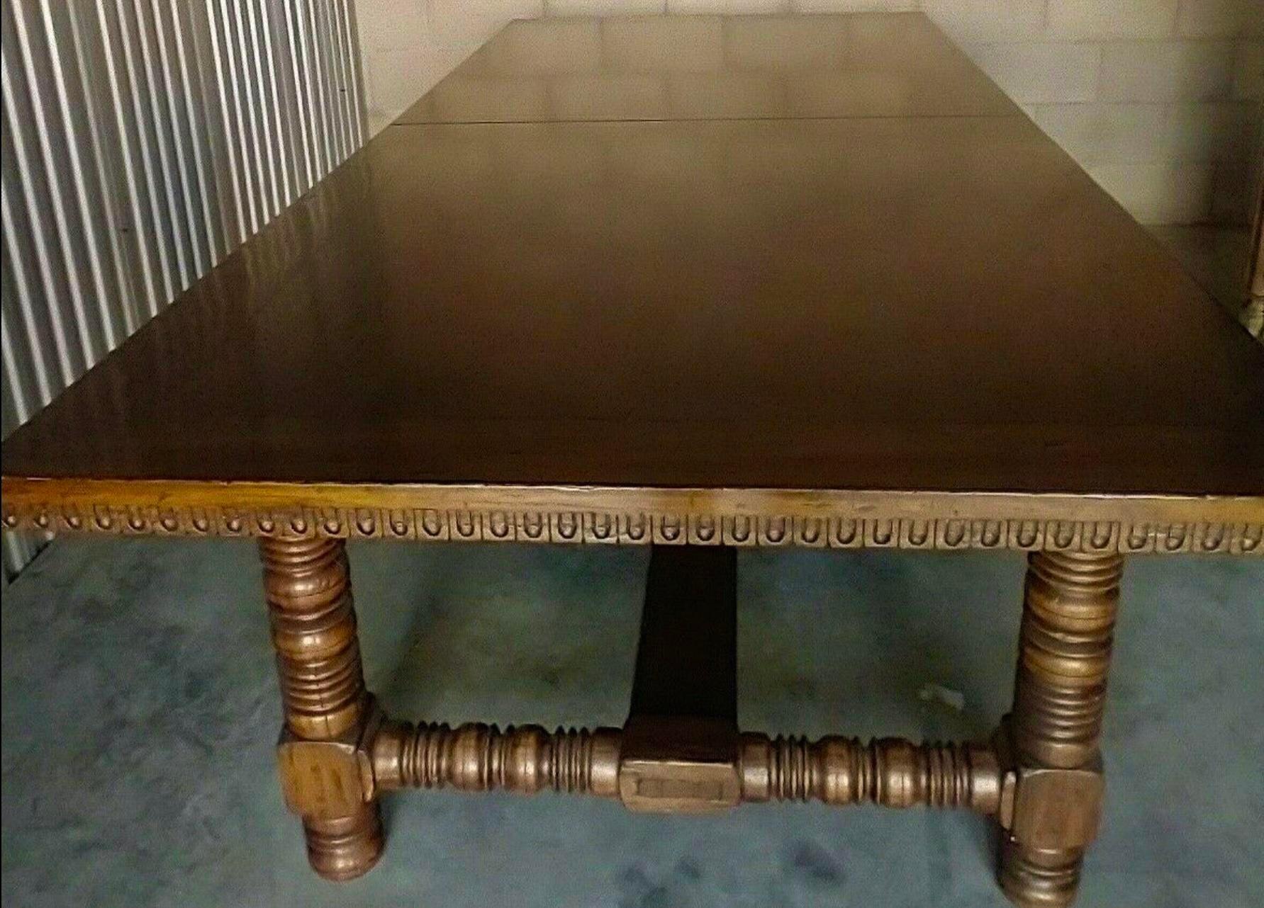 Alfonso Marina Ebanista 17th century style Spanish Colonial extension dining table. Includes one extension leaf which measures approximately 27