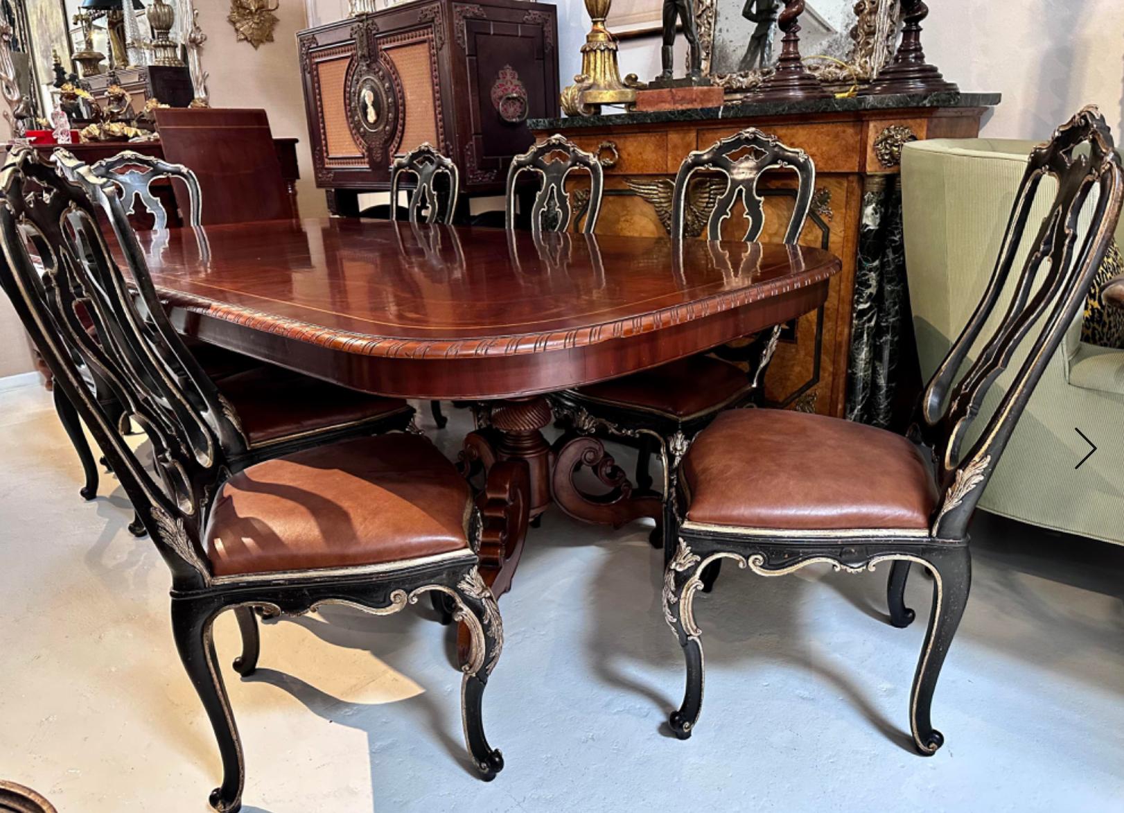 Alfonso Marina Ebanista Dining Table and Chairs Set. It includes the dining table w chick is 94” wide without leaves, plus 8 dining chairs with leather seats.