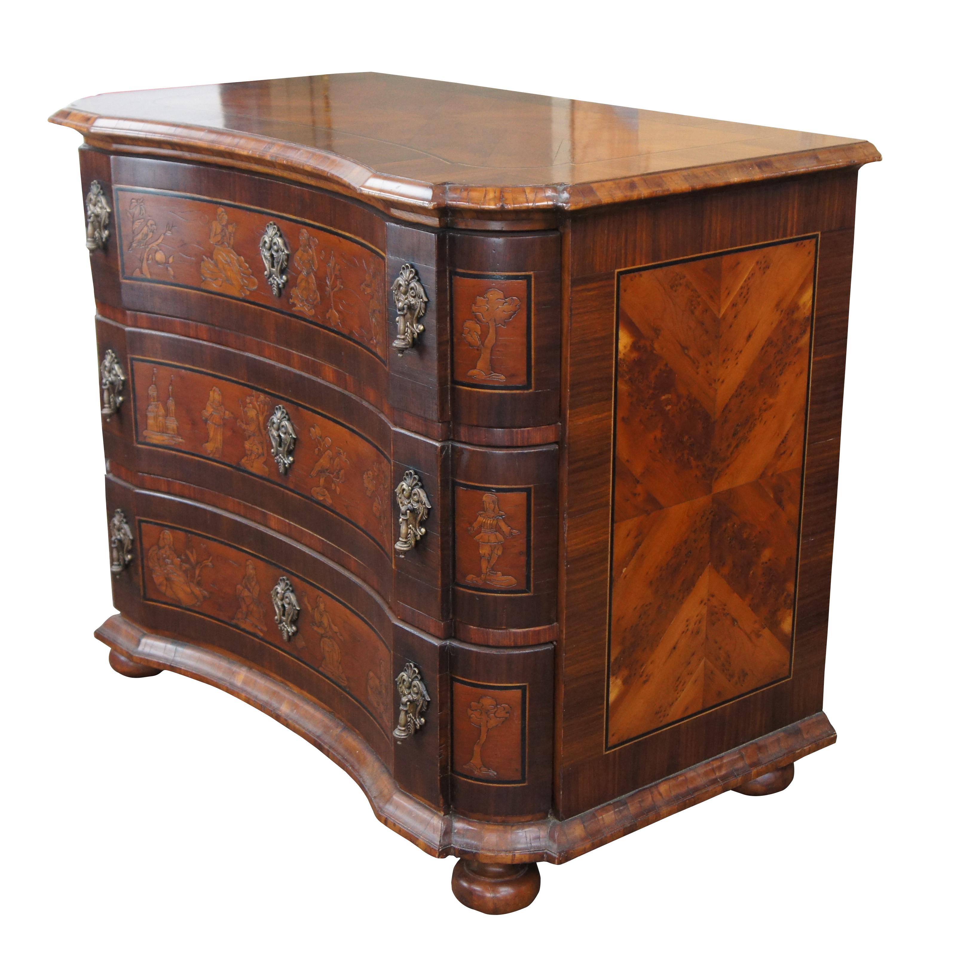 An exceptional Chinoiserie chest of drawers by Alfonso Marina. A serpentine form made of mahogany, walnut and exotic matchbook burled panels with cossbanding. The front of the chest showcases three drawers centered by oriental scenes with wise men,