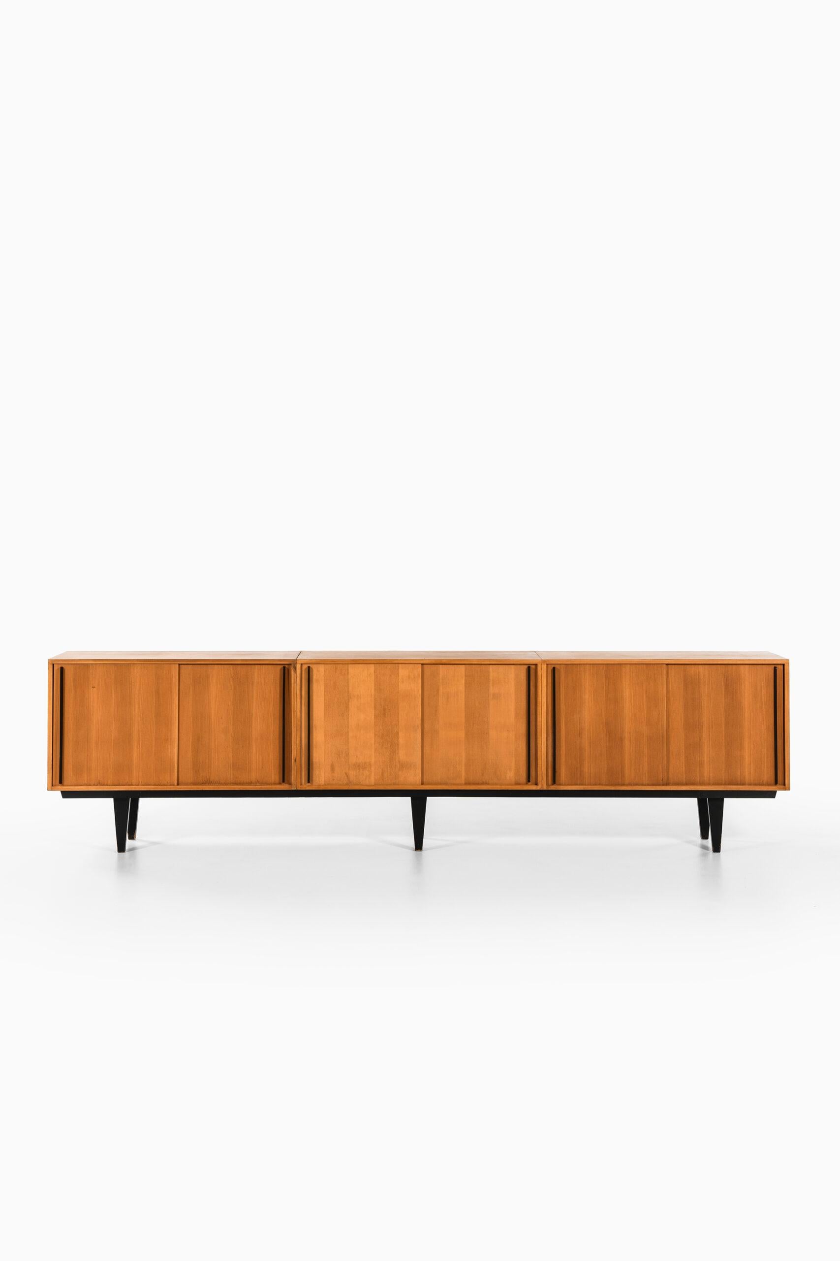 Very rare and long sideboard designed by Alfred Altherr. Produced by K.H. Frei Freba Typenmöbel in Switzerland.