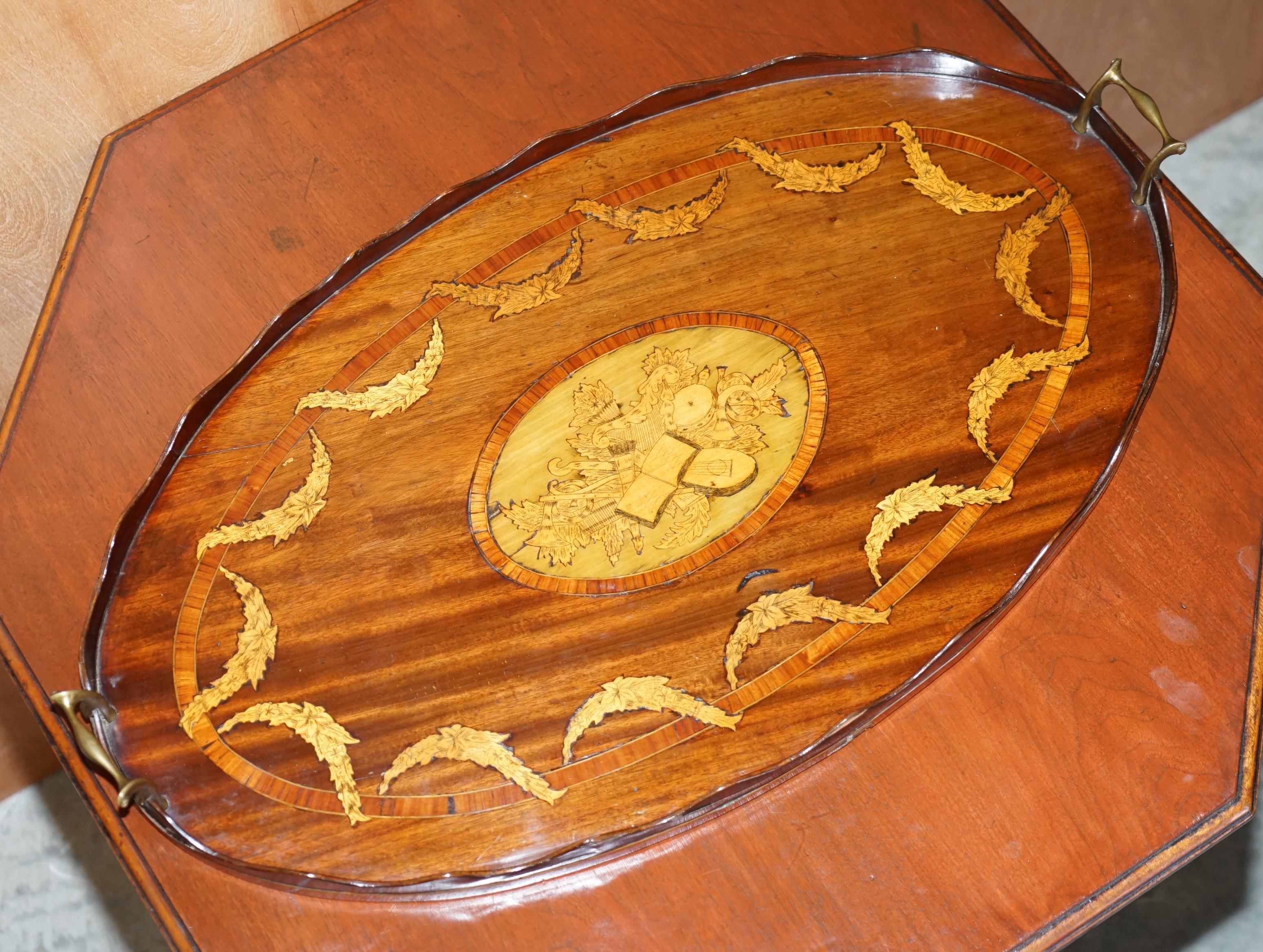 We are delighted to offer this exquisite very well made original Victorian walnut Sheraton inlaid large butlers serving tray with bronze handles after the works of the genius that was Alfred Beurdeley

This is a pretty much the finest example of