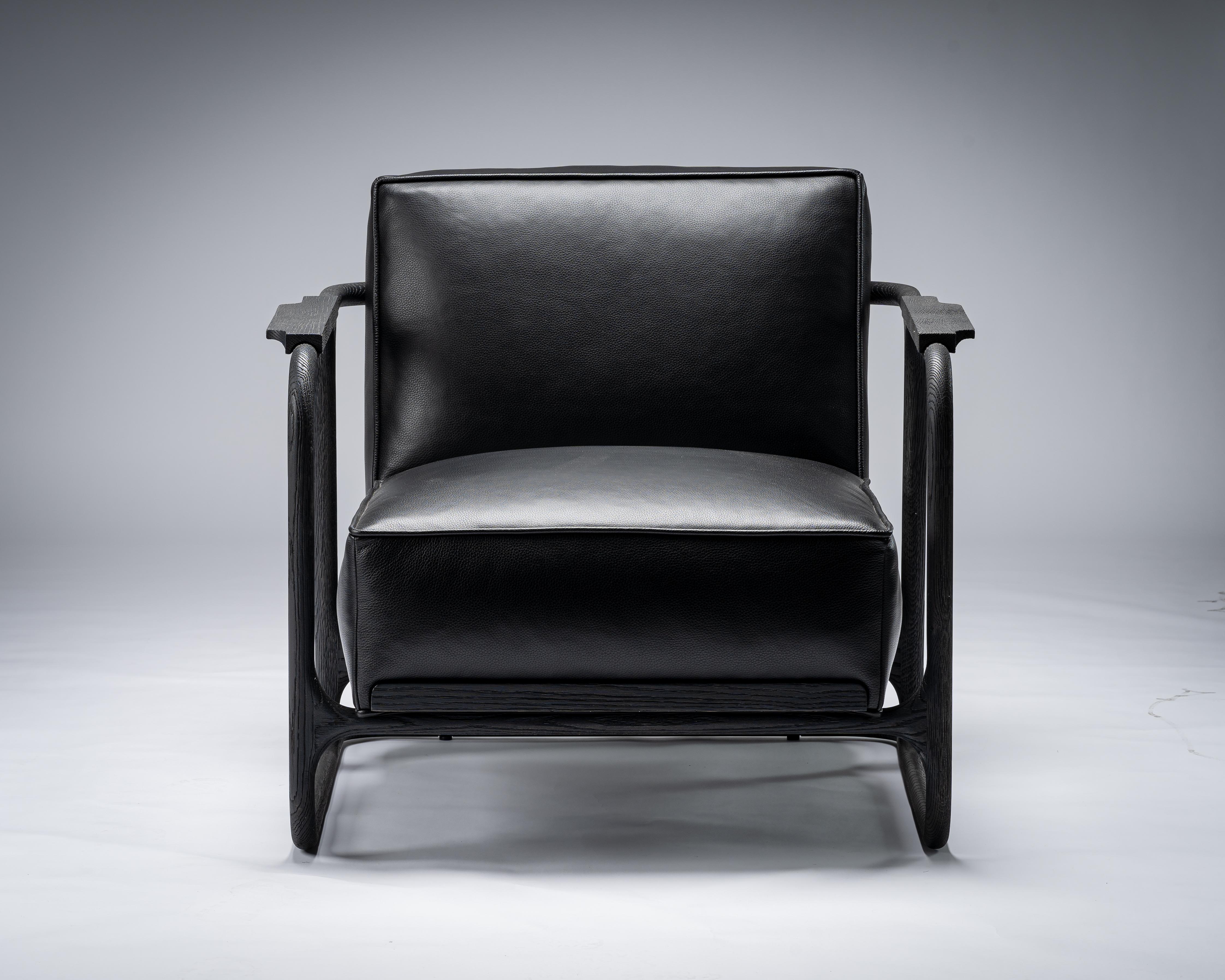 Schwarzer stuhl ALFRED von Mandy Graham

ALFRED
A01, Stuhl Lounge Sessel
Nussbaum / sandgestrahlte Eiche und Leder
Maße: 33.75