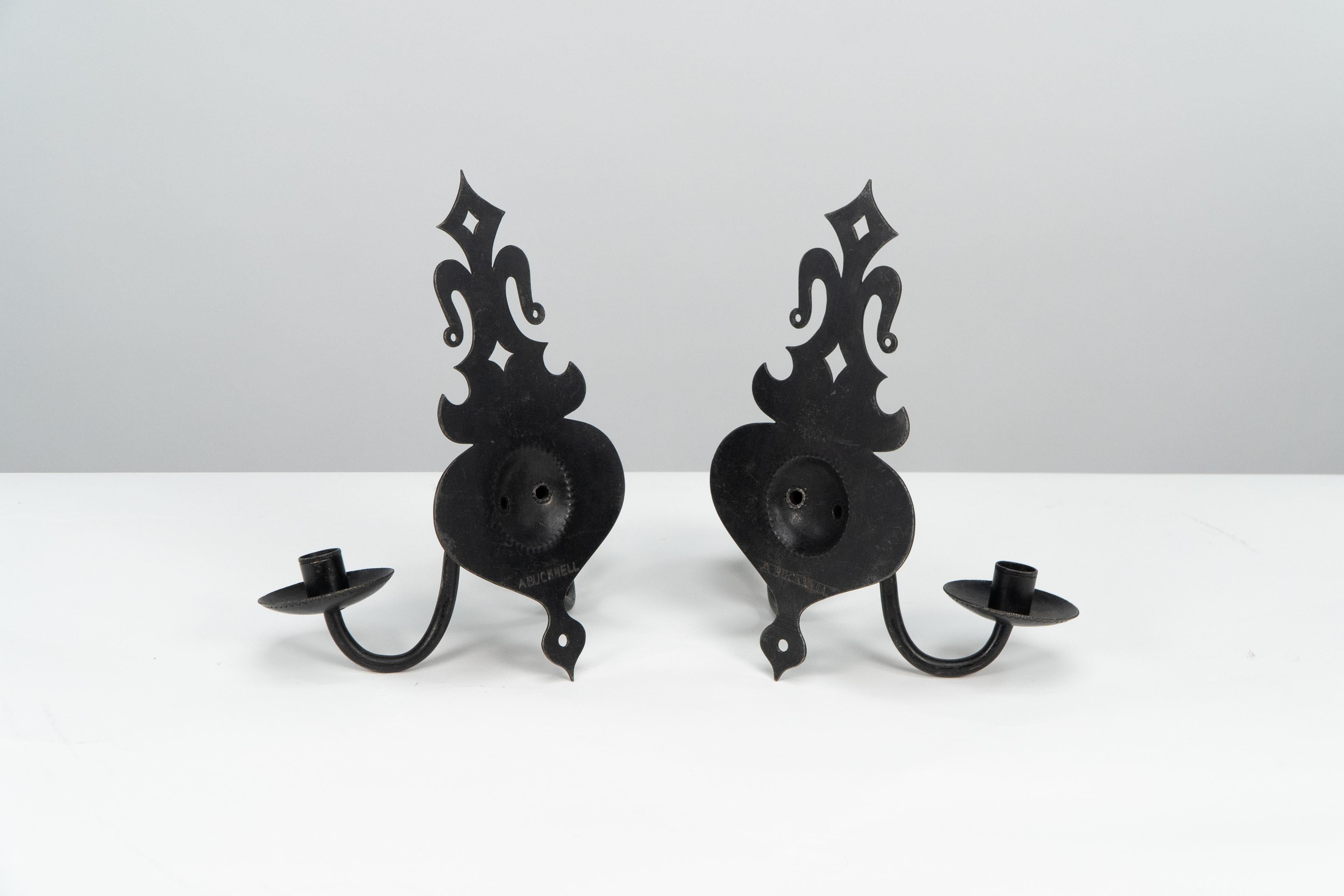 Alfred Bucknell. A rare pair of Arts & Crafts museum quality steel wall sconces. In Good Condition For Sale In London, GB