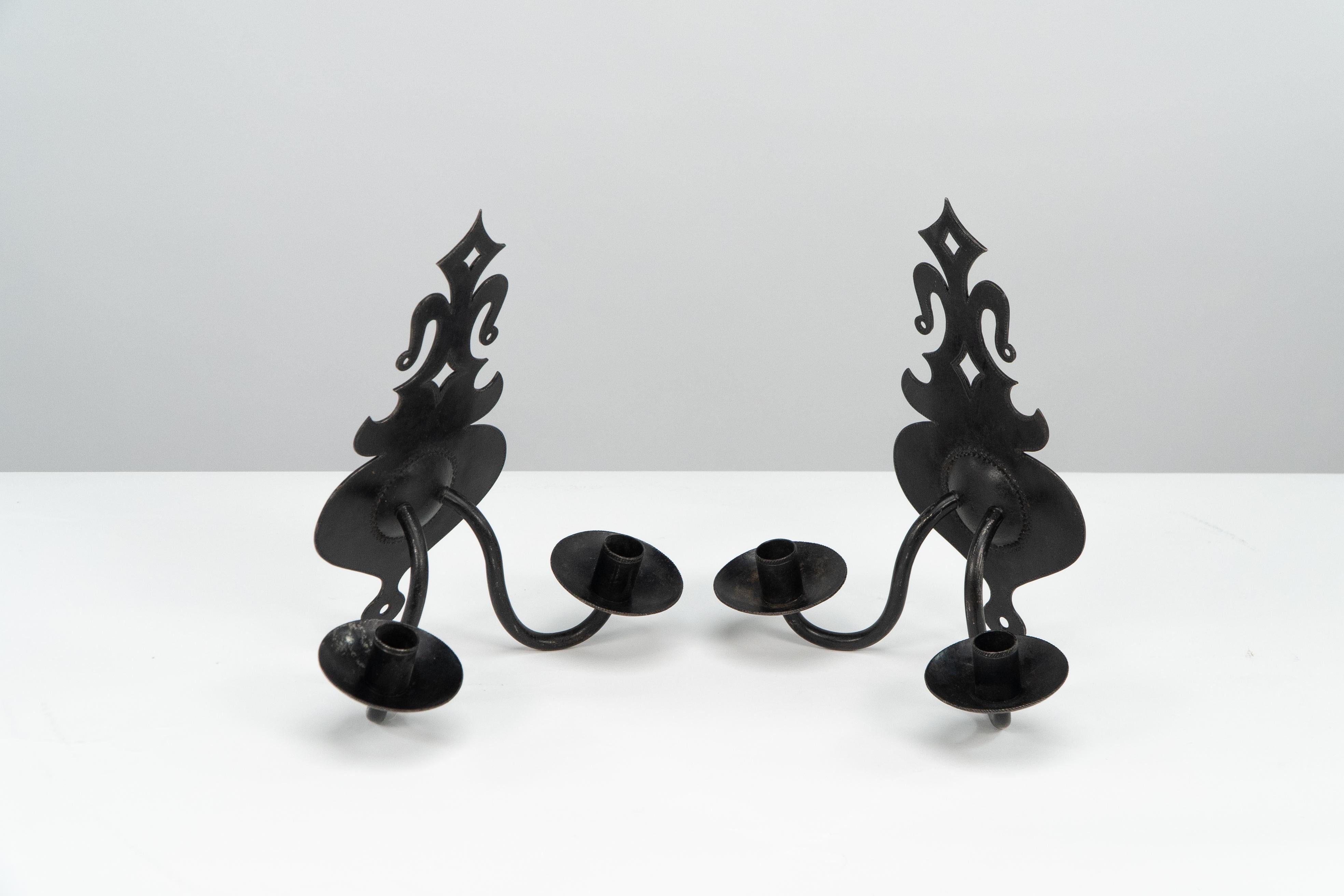 Steel Alfred Bucknell. A rare pair of Arts & Crafts museum quality steel wall sconces. For Sale
