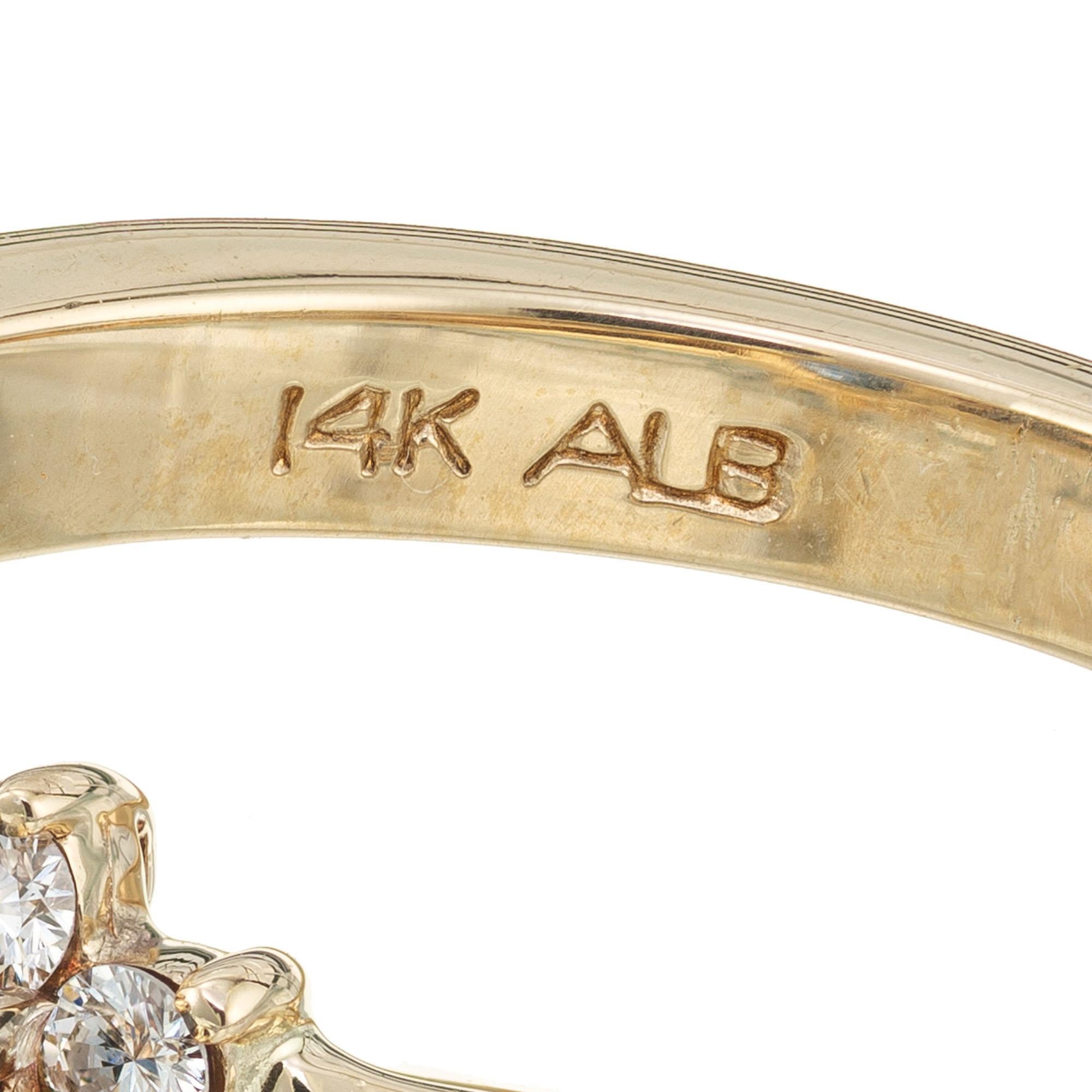 Alfred Butler, bague de fiançailles en or avec saphir ovale de 2,00 carats et halo de diamants en vente 1